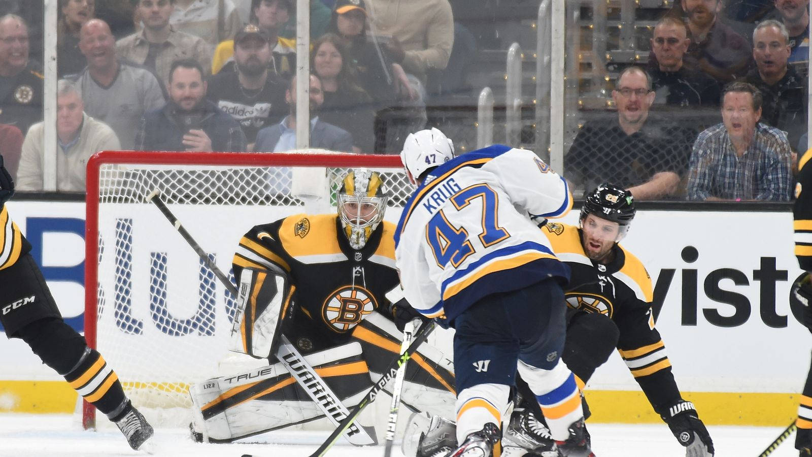 Torey Krug Tries To Goal Against Bruins Background