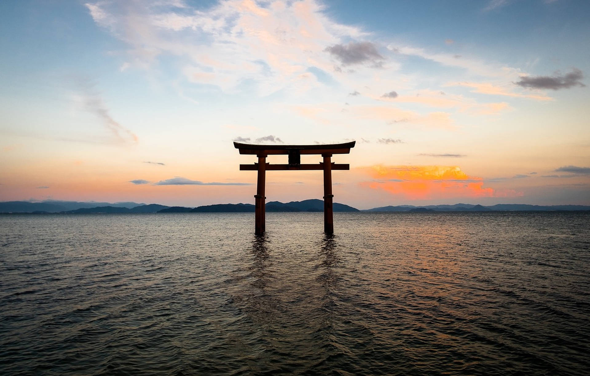 Torii Gate In The Sea Background