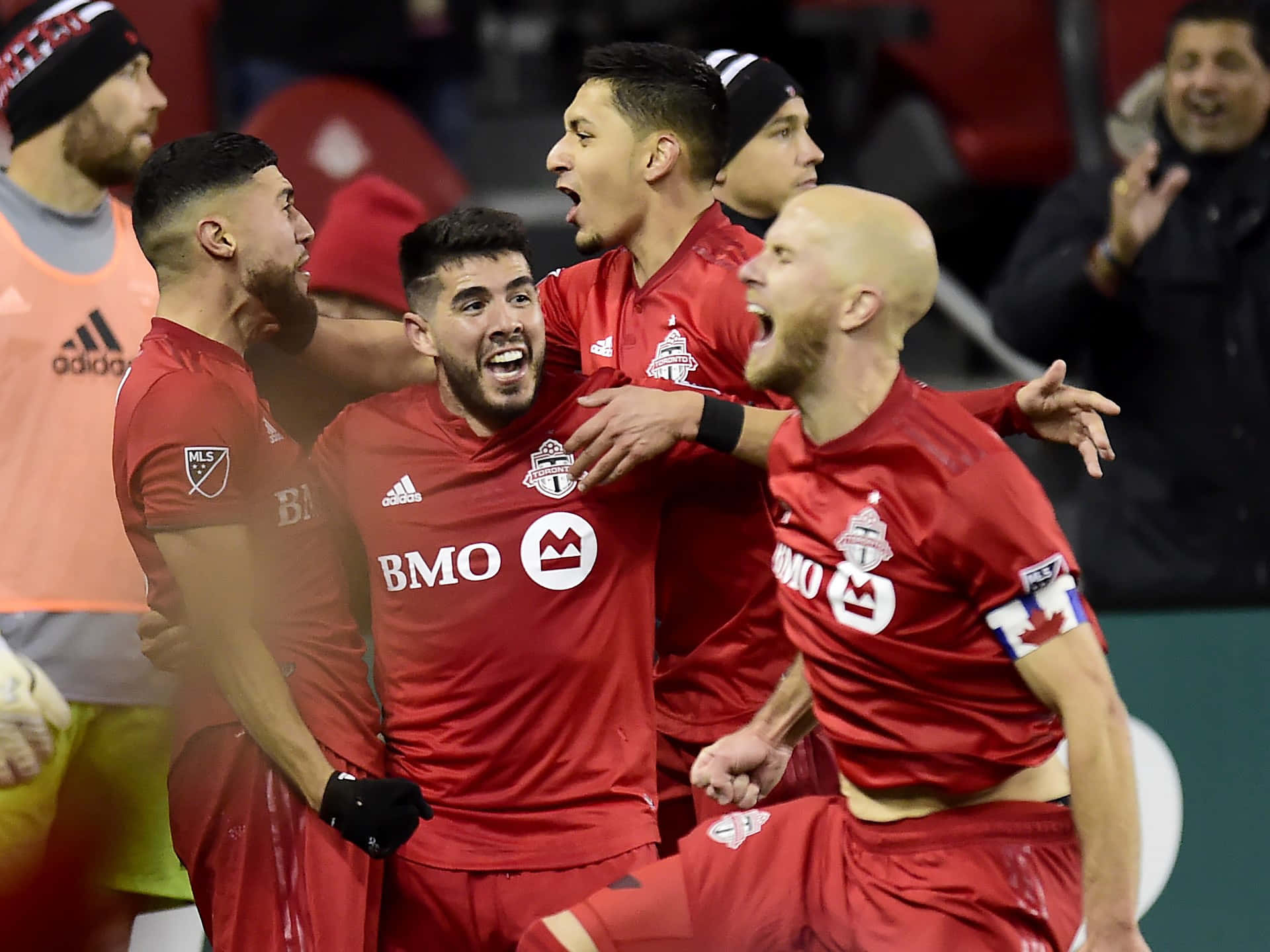 Toronto Fc Alejandro Pozuelo With Teammates Background