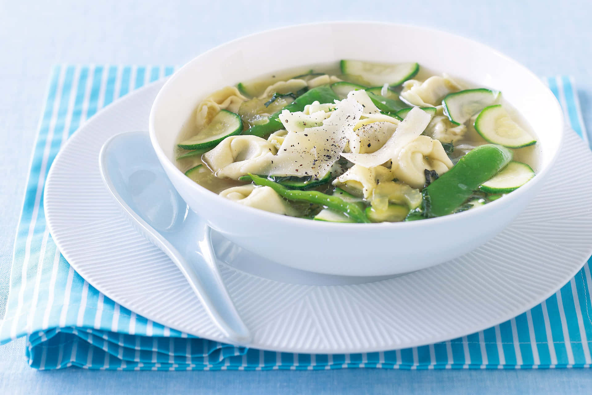 Tortellini In Brodo With Cucumbers Background