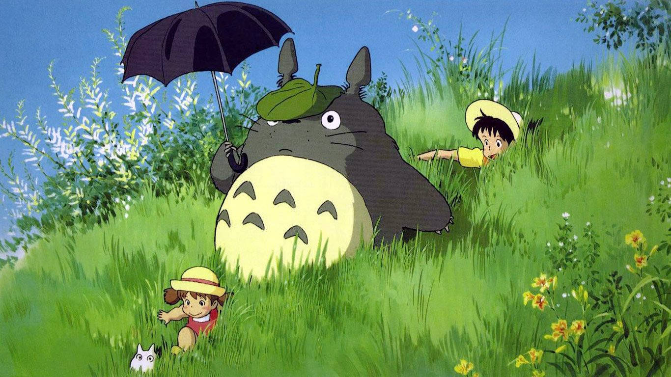 Totoro Playing On Grass Background
