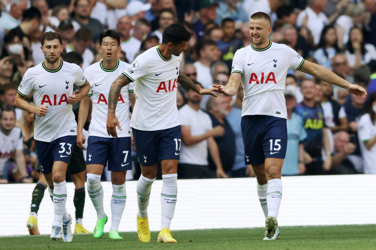 Tottenham Hotspurs Fc Members Walking Together In White