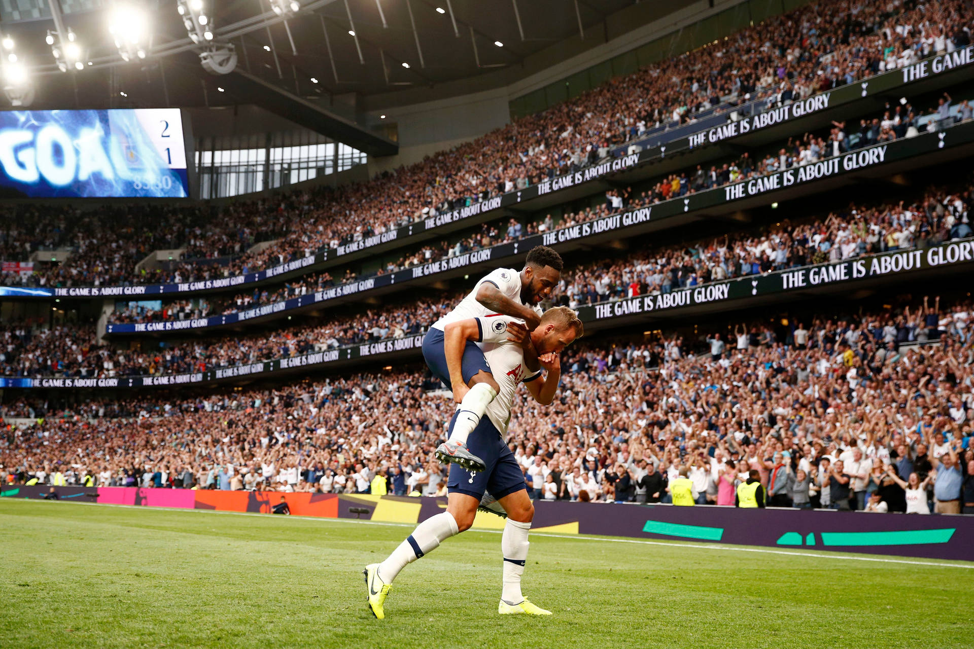 Tottenham Hotspurs Fc Players Piggy Back