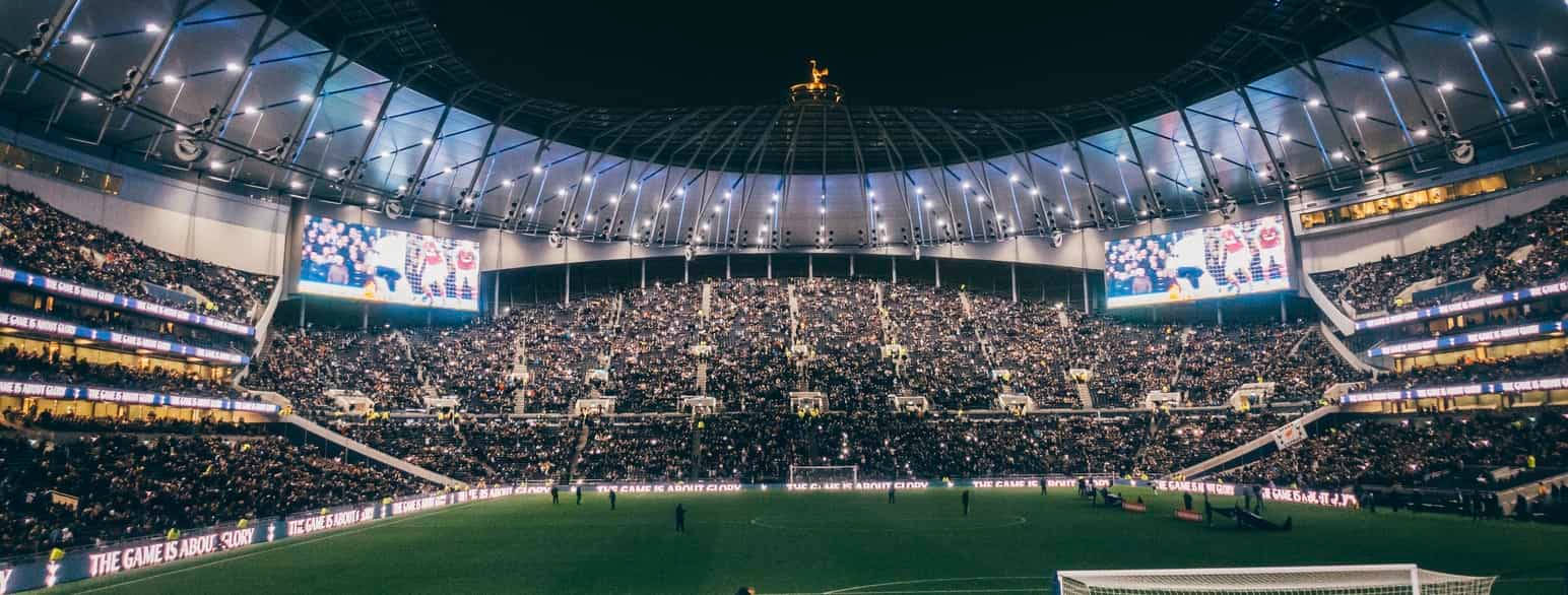 Tottenham Hotspurs Fc Stadium Interior At Night