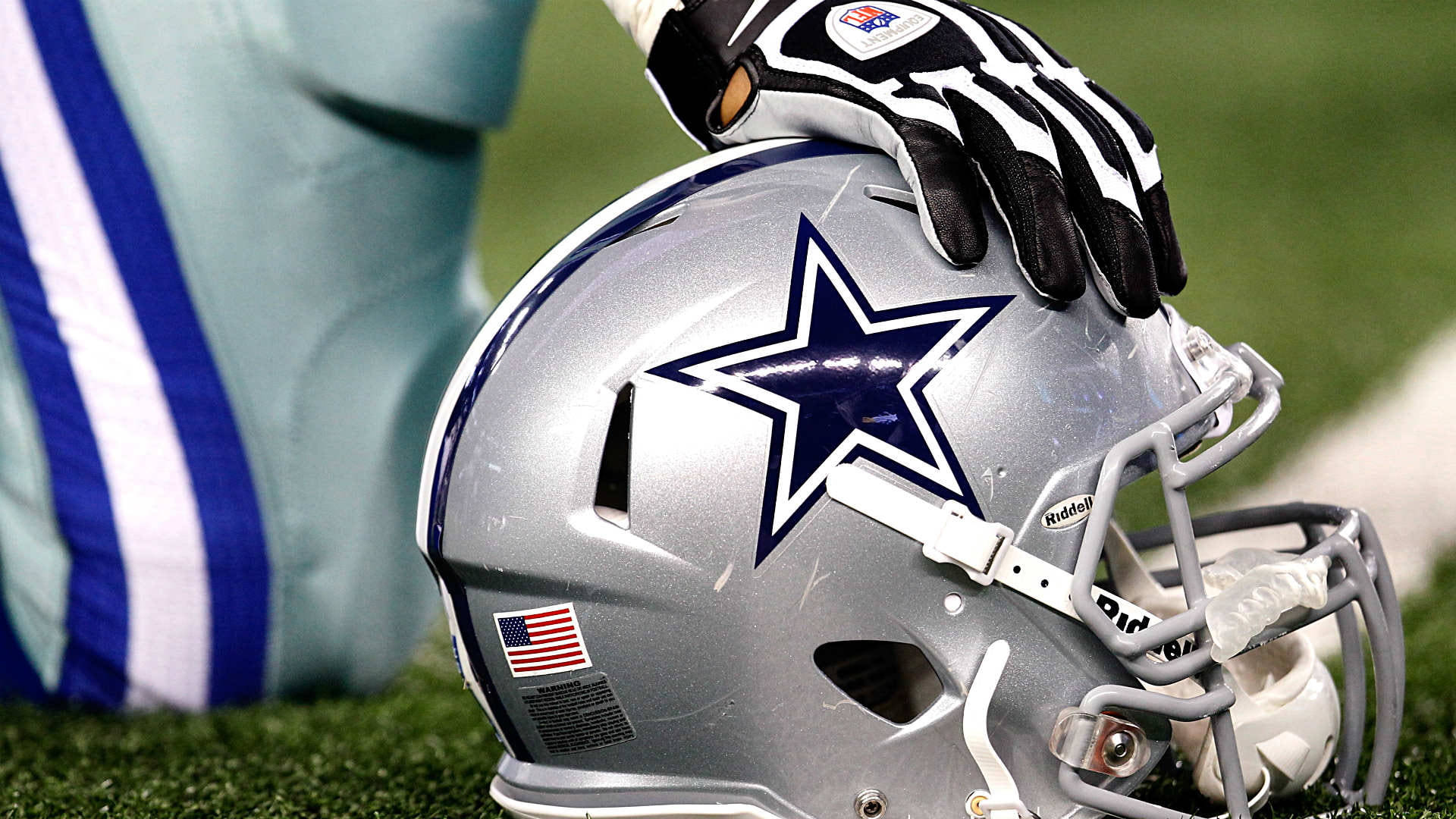 Touching A Helmet Of Awesome Dallas Cowboys Background