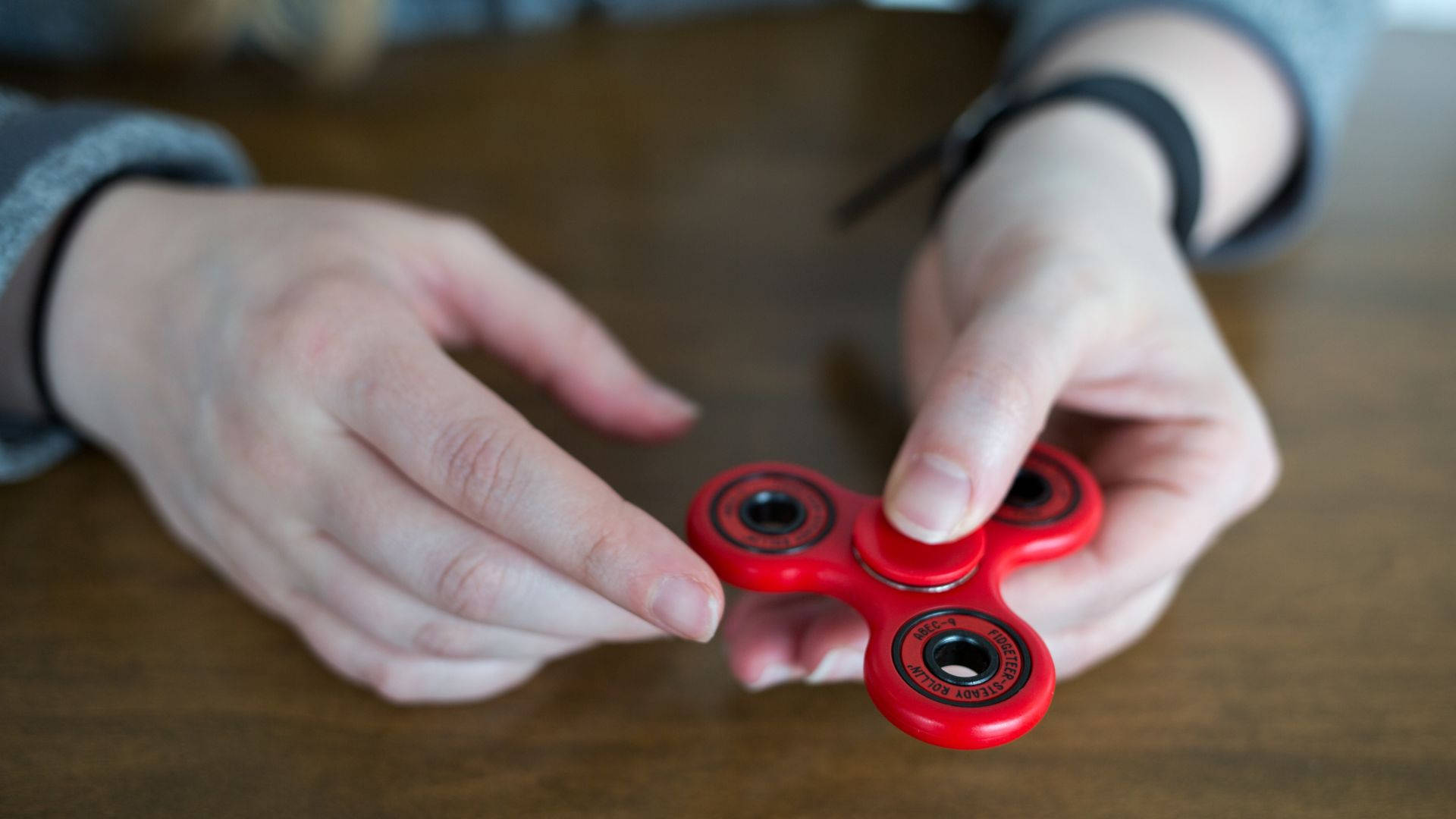 Touching Red Fidget Toy Background
