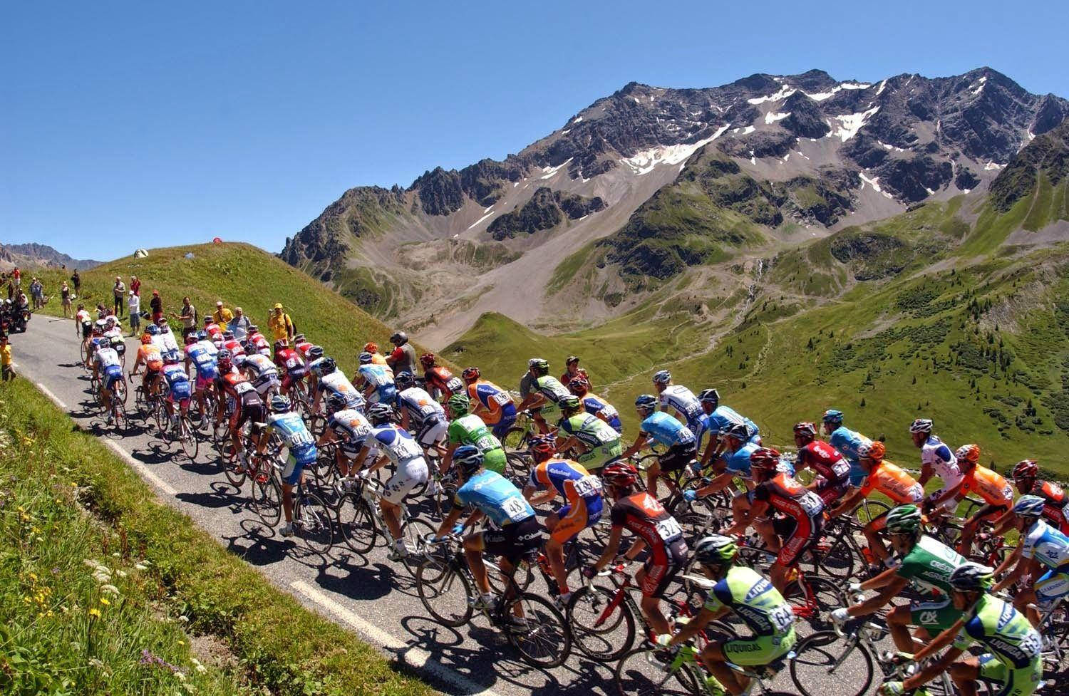 Tour De France On Uphill Road Background