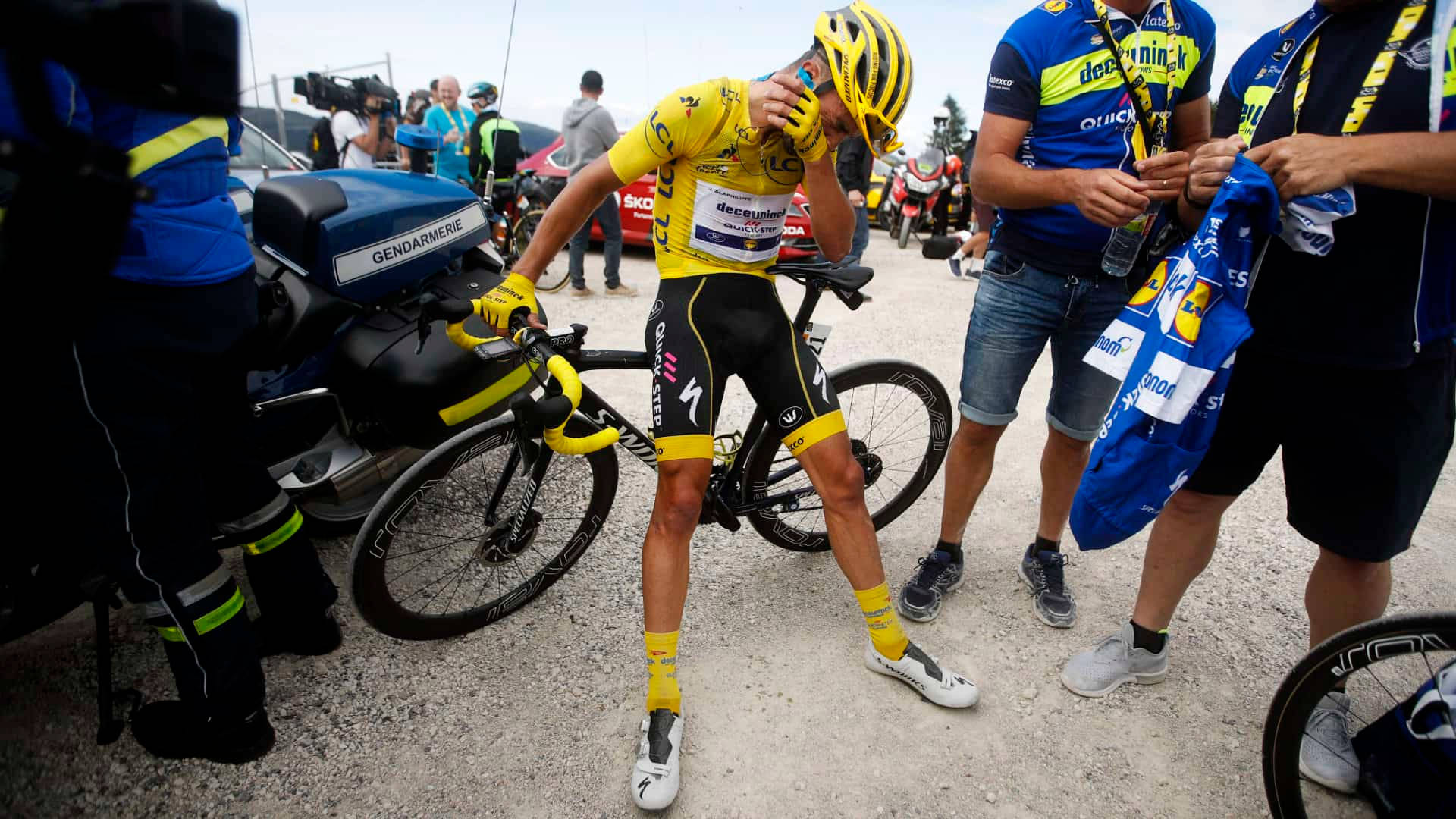 Tour De France With Crying Biker Background