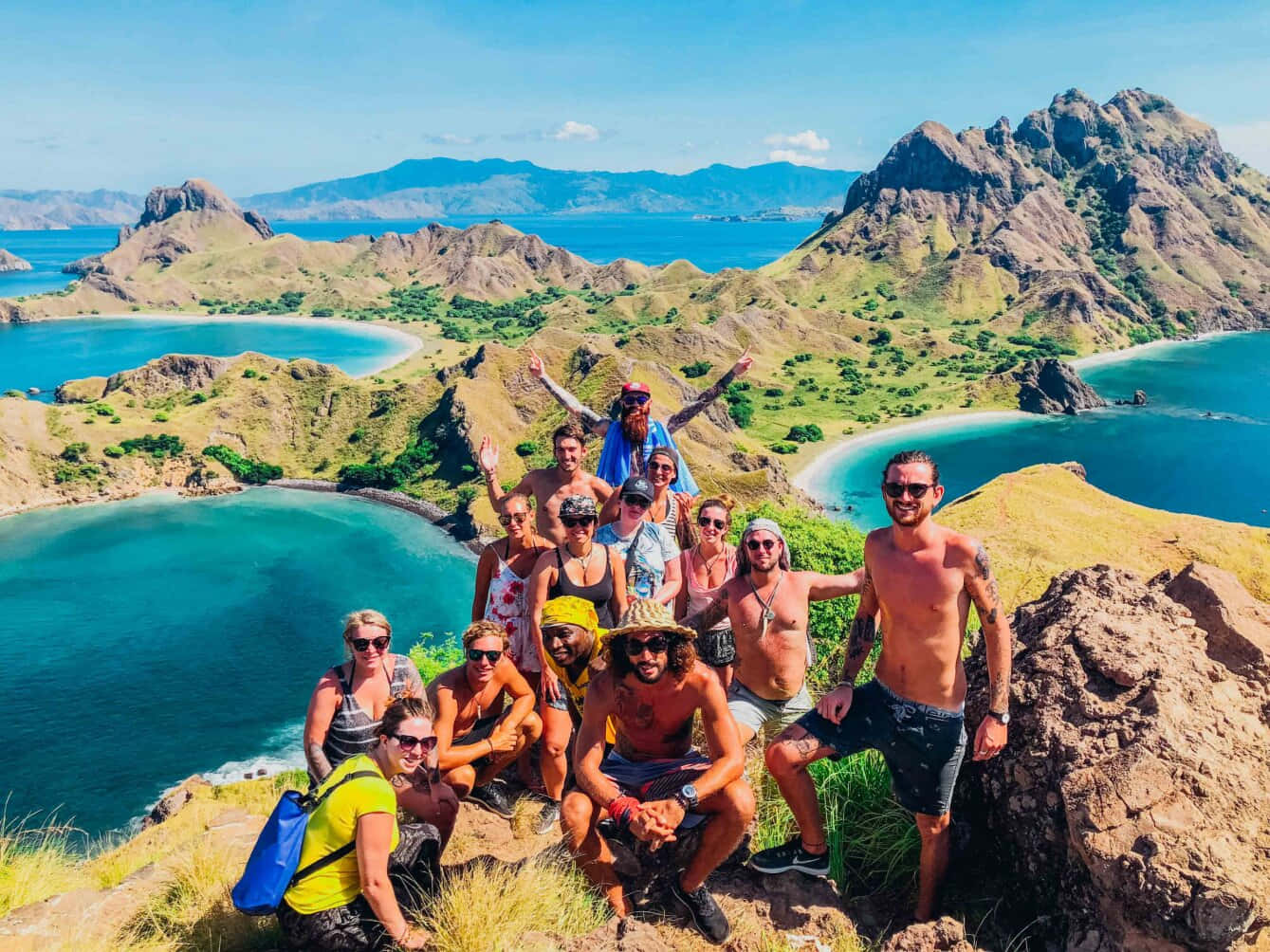 Tourist Group Shot On Komodo Island Background