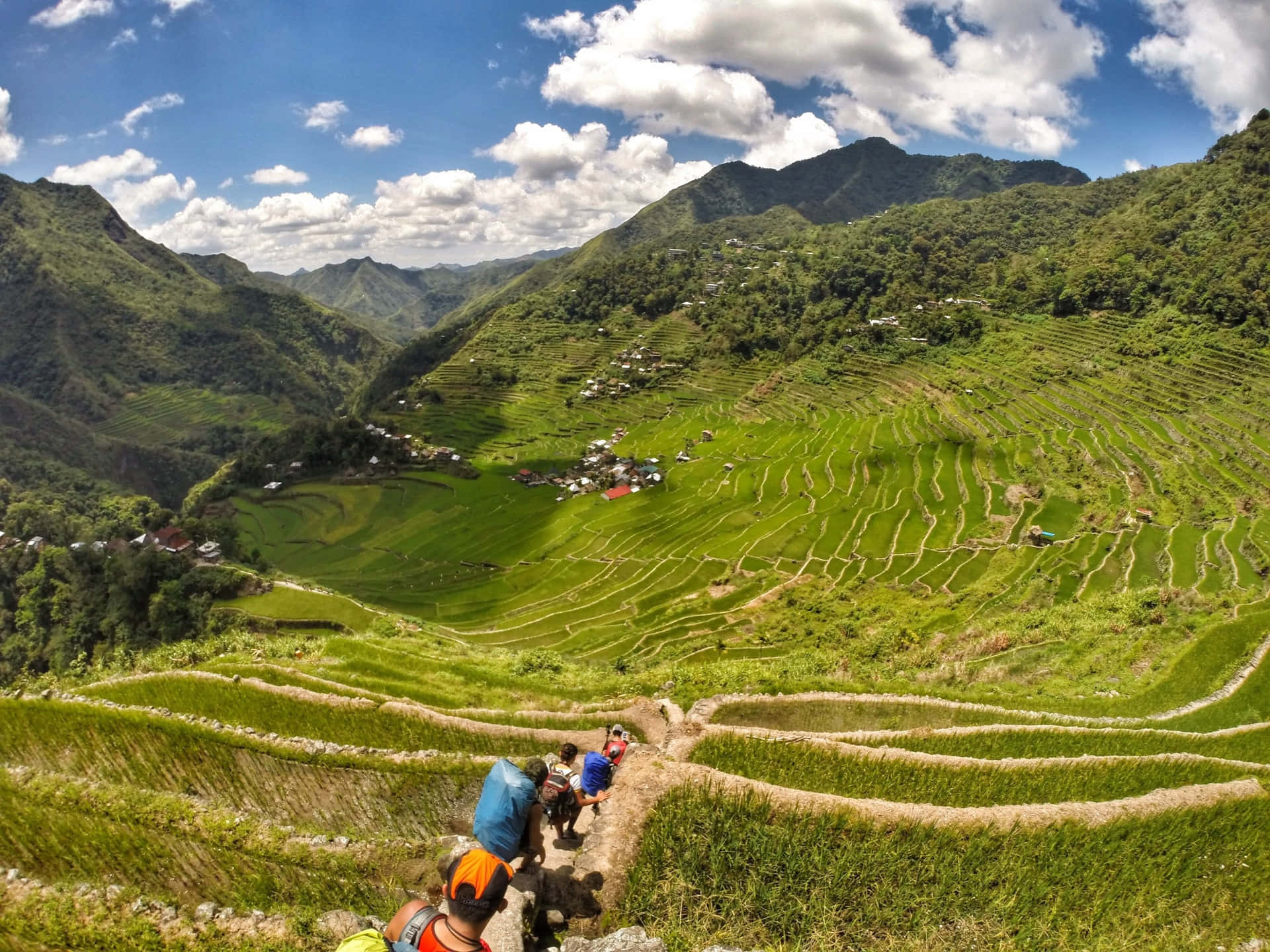 Tourists Hiking At Banaue Rice Terraces Philippines Background