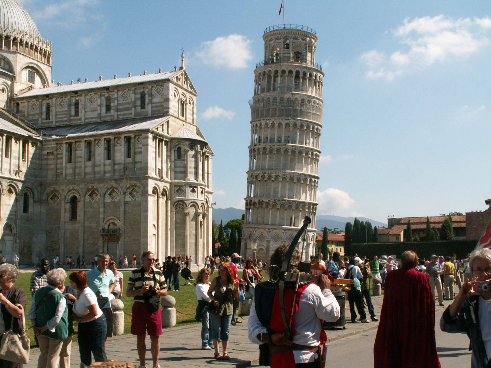 Tourists In Pisa Background