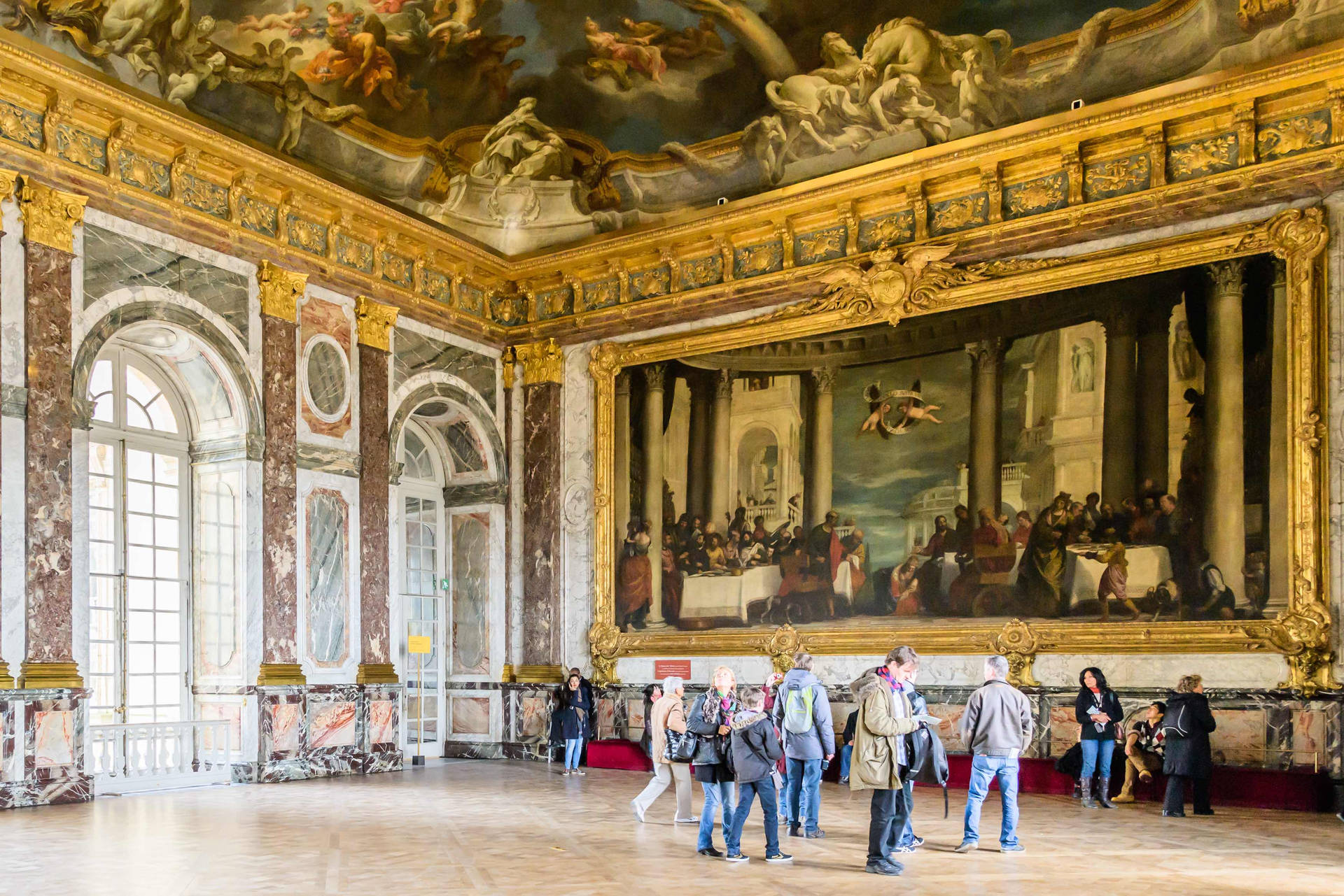Tourists Inside The Palace Of Versailles