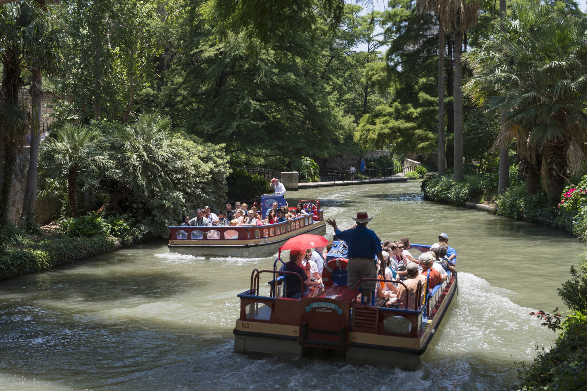 Tourists On San Antonio River Walk Boat Background