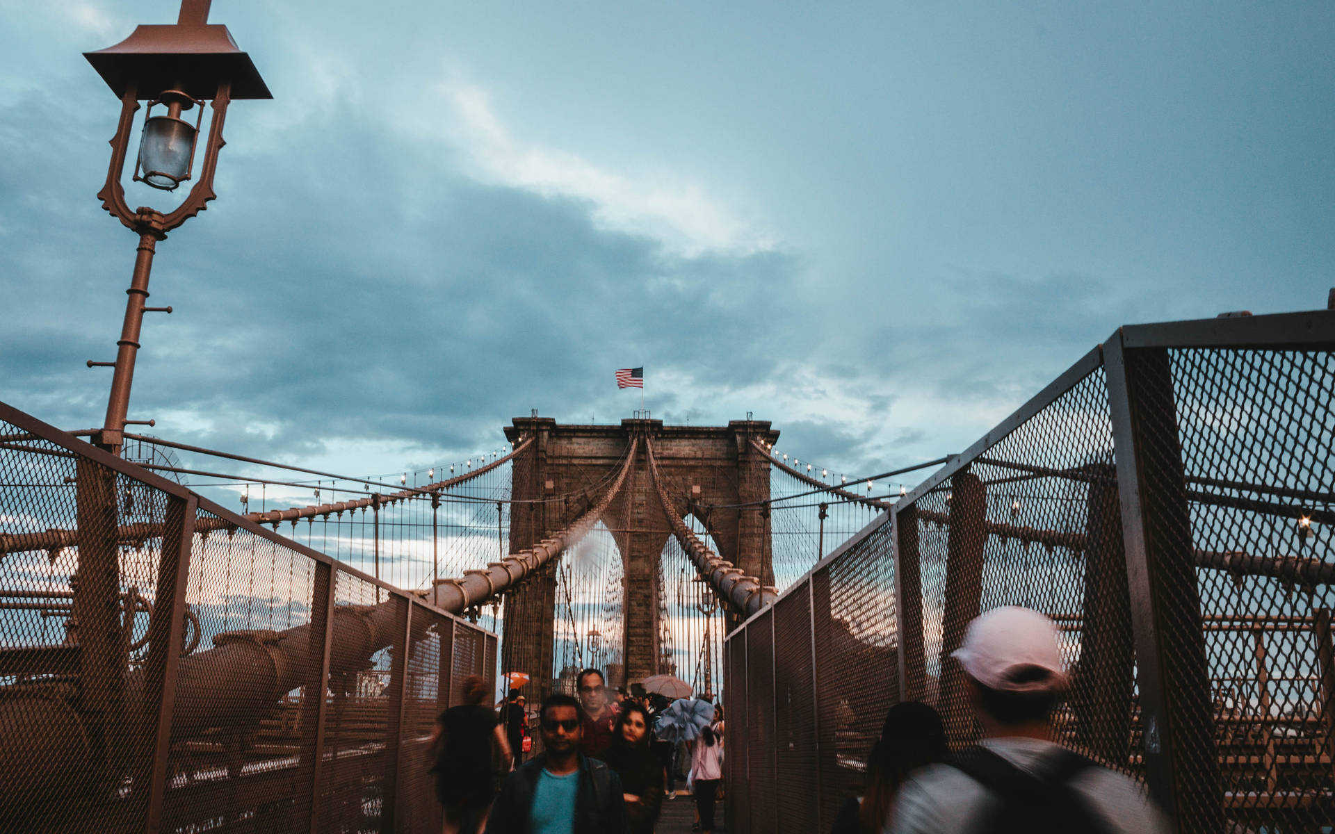 Tourists On The Brooklyn Bridge Background