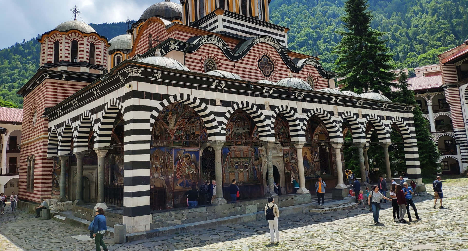 Tourists Outside The Rila Monastery