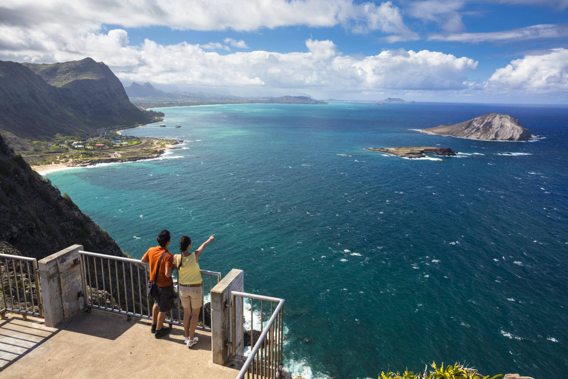 Tourists Overlooking Oahu Ocean View Background