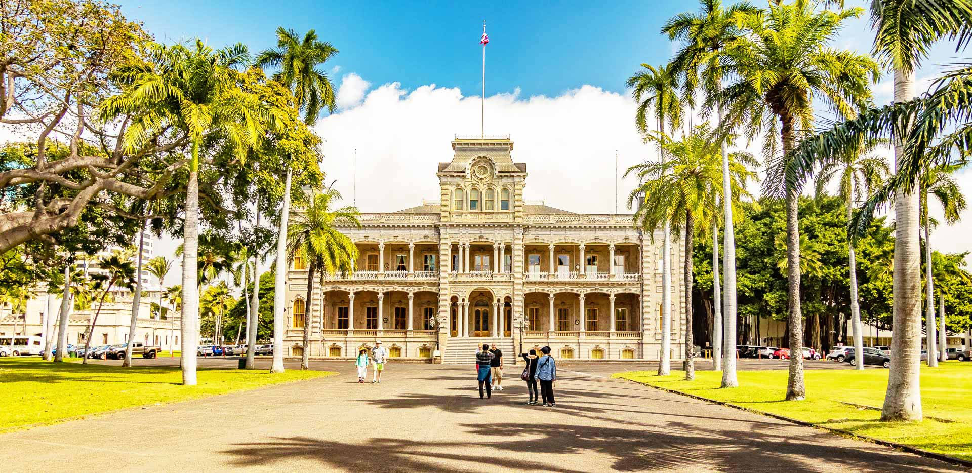 Tourists Walking Towards Iolani Palace Background