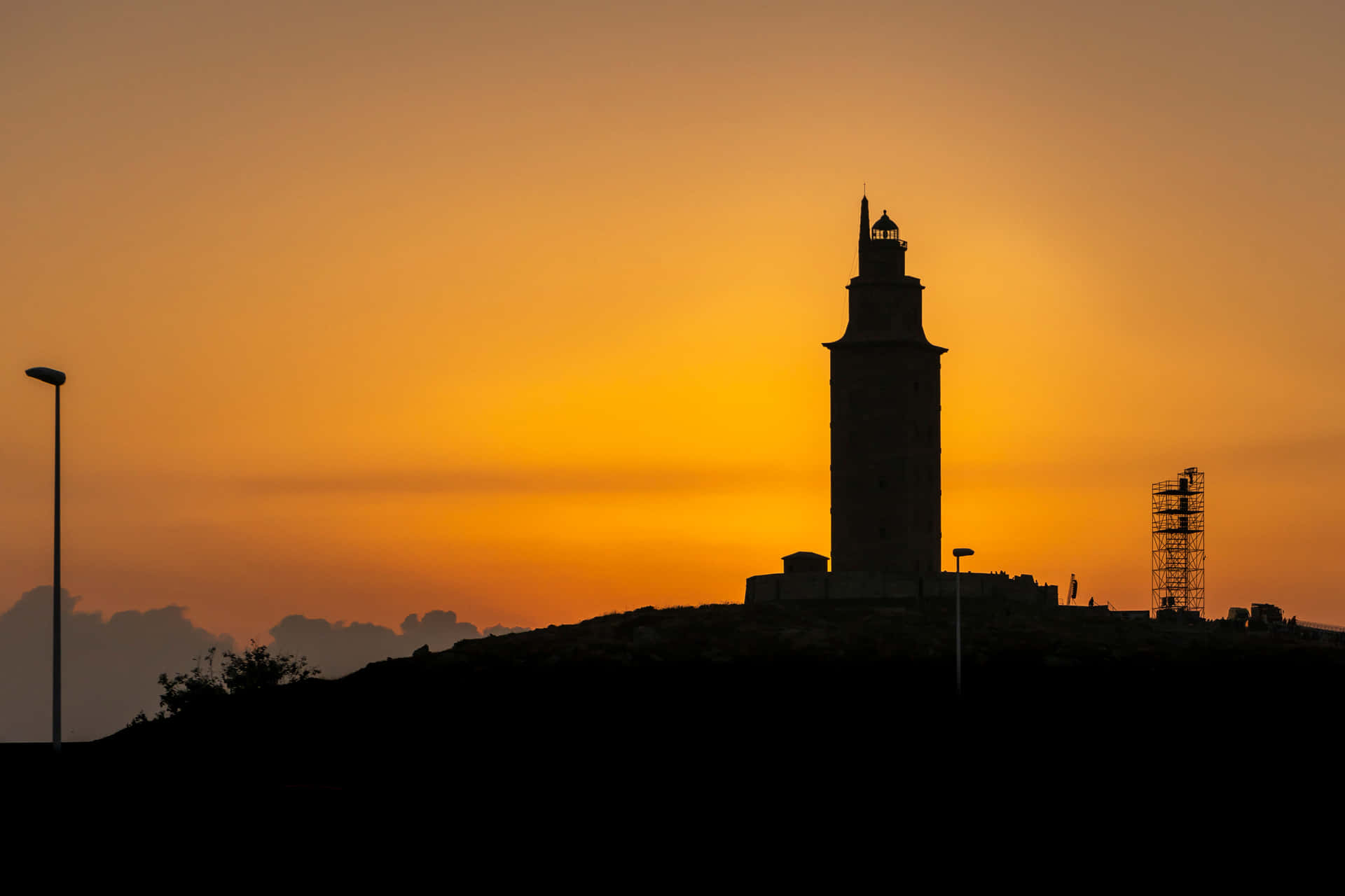 Tower Of Hercules At Sunset Orange Aesthetic Desktop Background