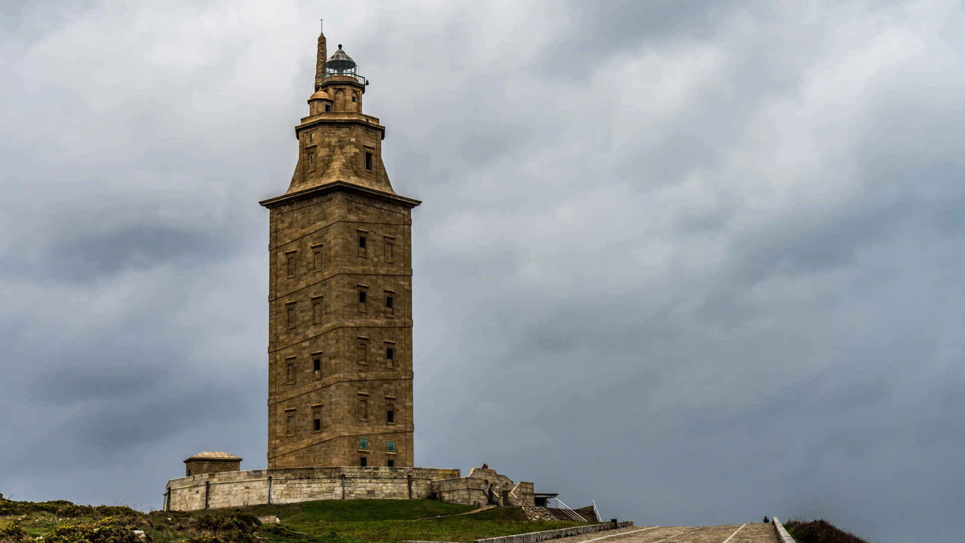 Tower Of Hercules Beneath Cloudy Sky Desktop Background