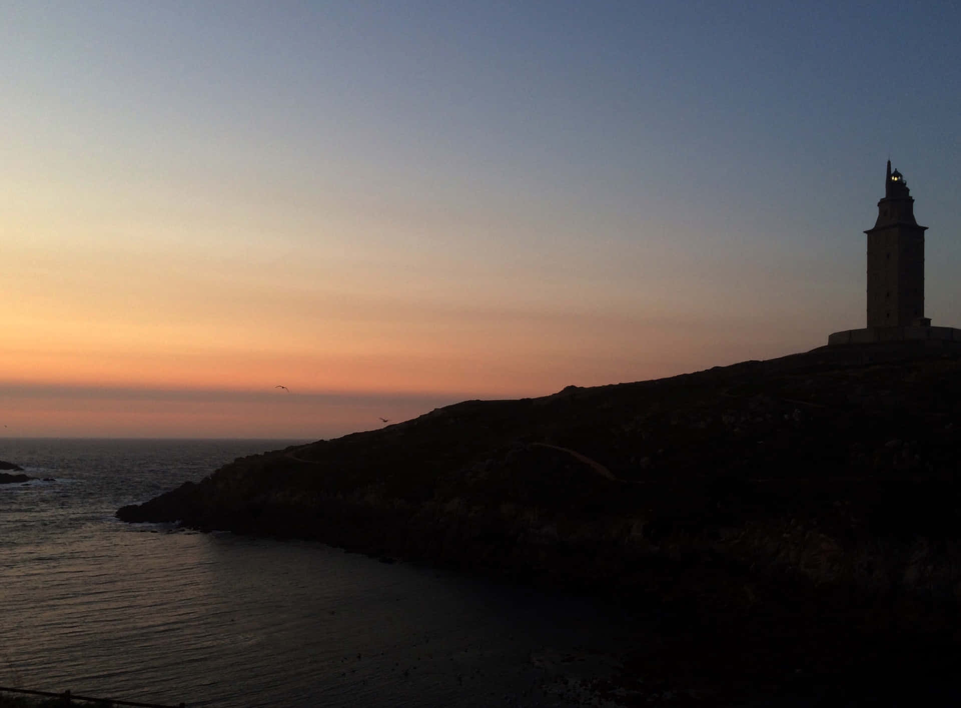 Tower Of Hercules Silhouette In The Afternoon Background