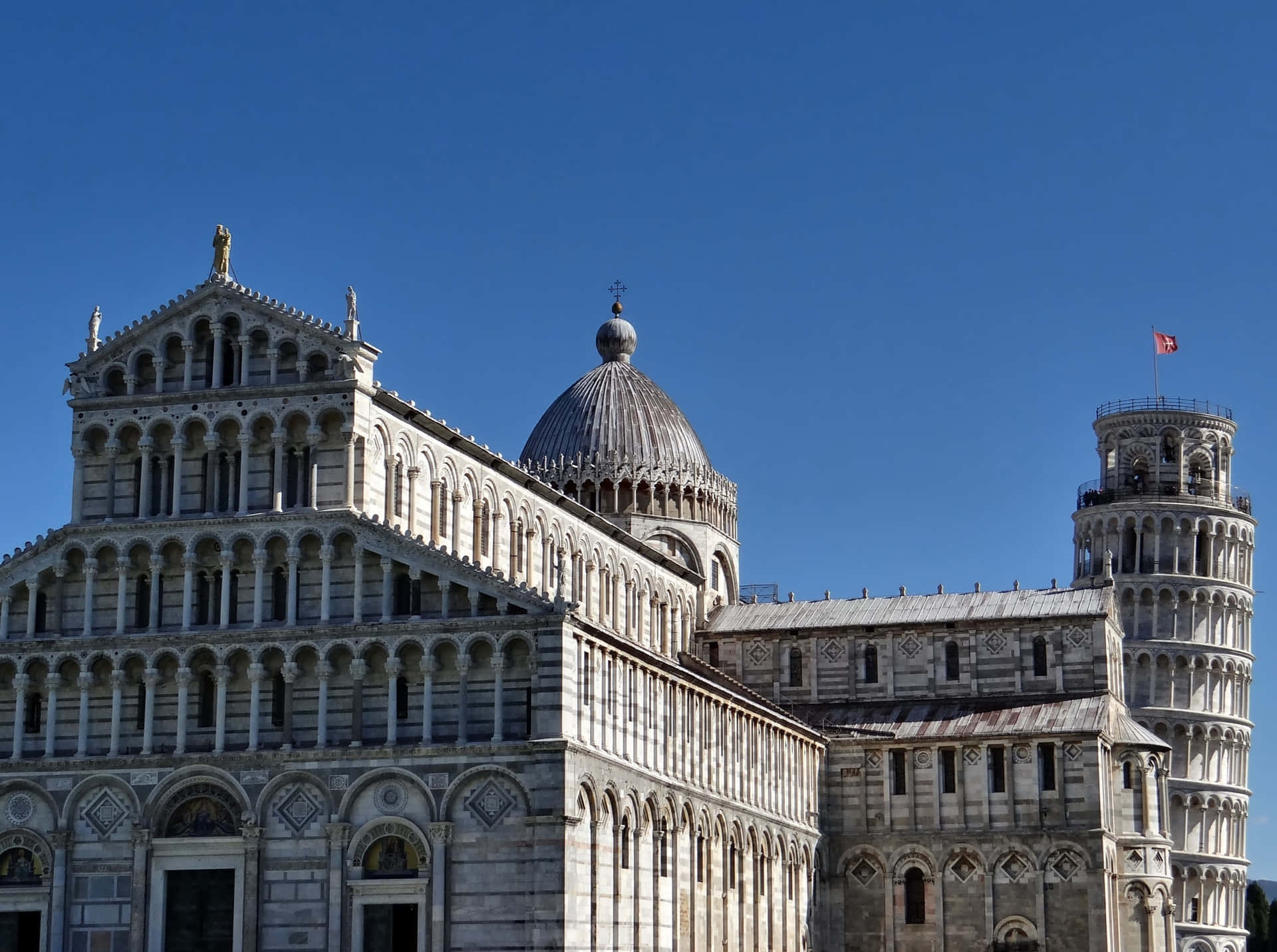 Tower Of Pisa Behind The Cathedral Background