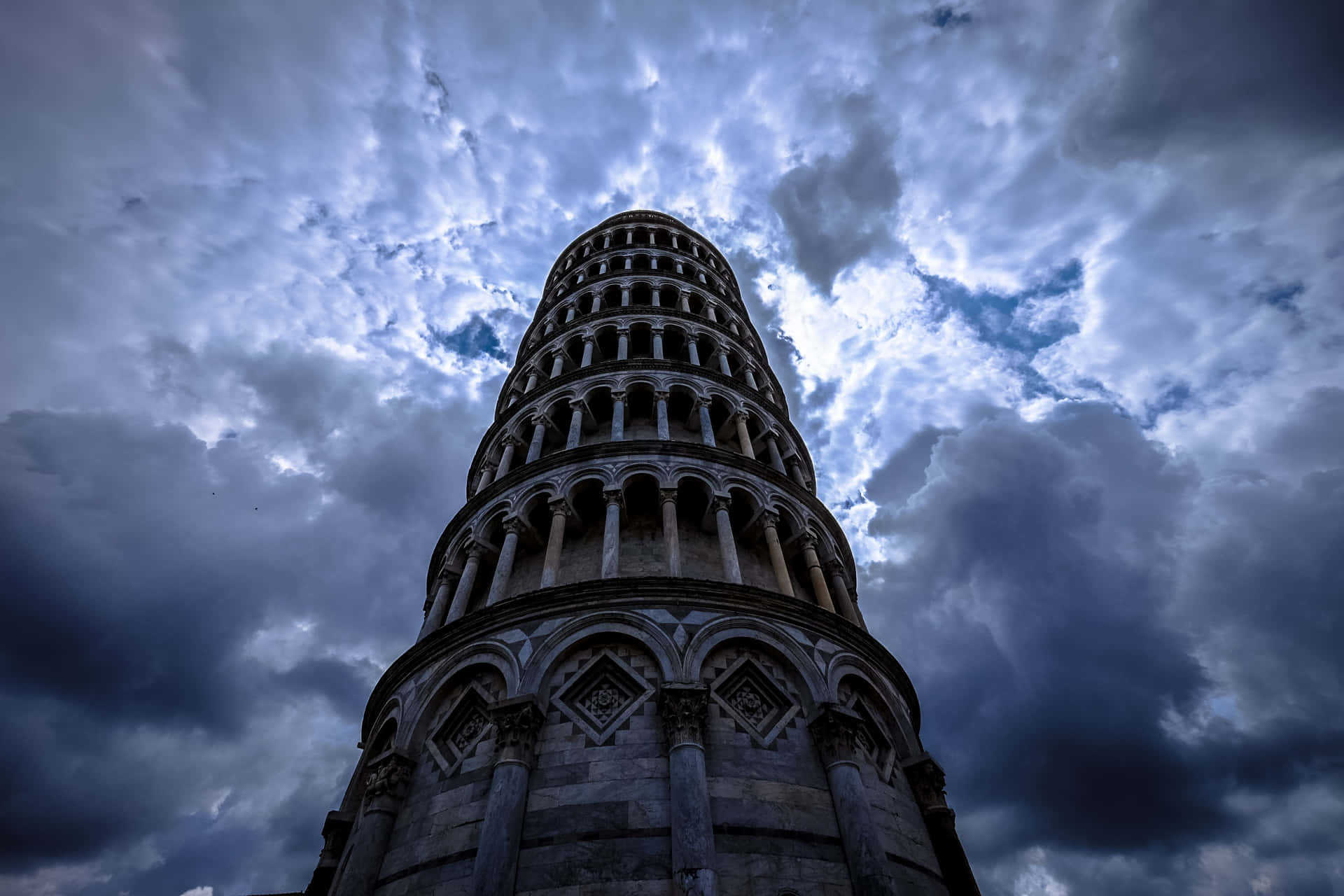 Tower Of Pisa Under Stormy Skies