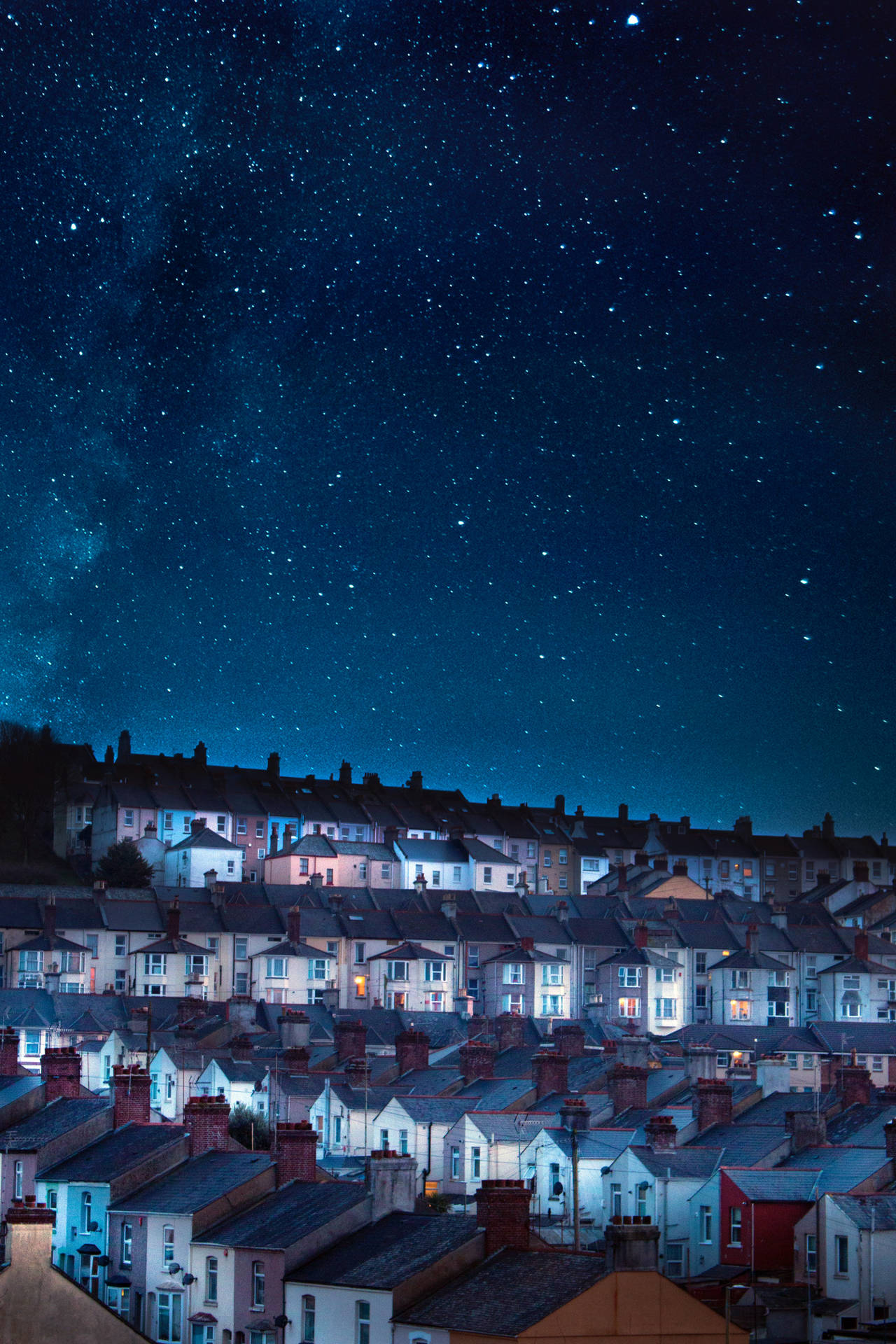 Town Under Starry Sky Background