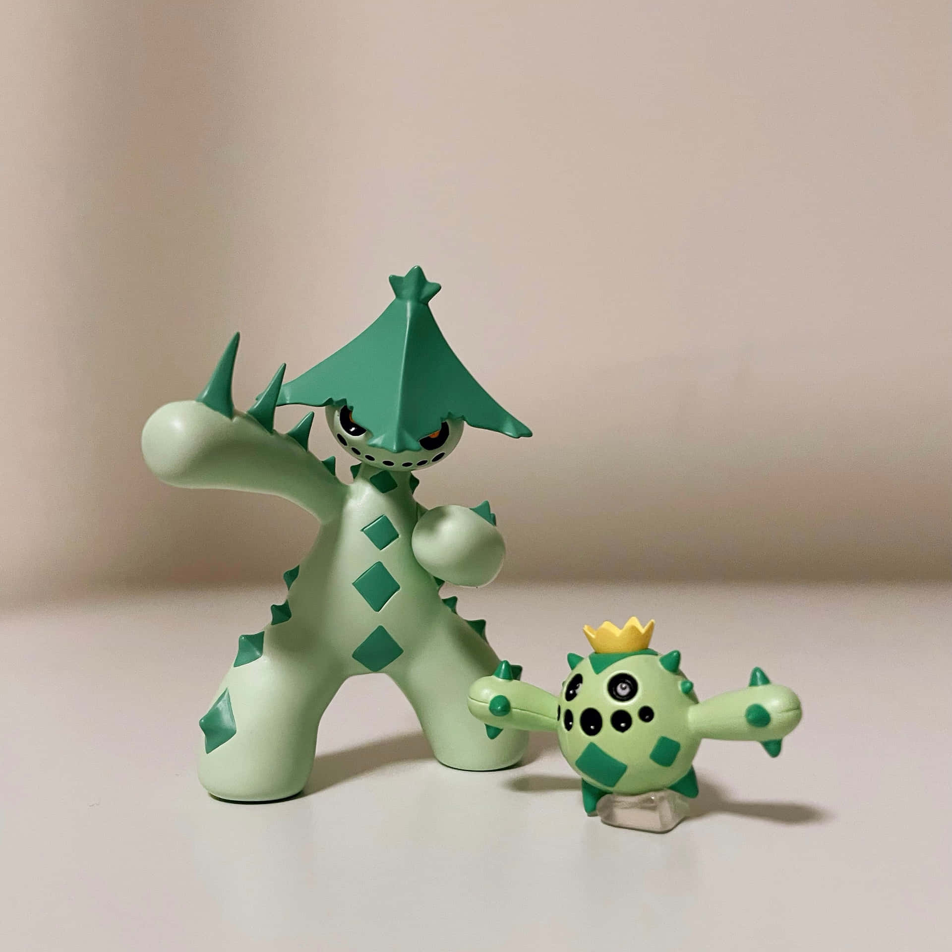 Toy Figures Of Cacturne And Cacnea Background