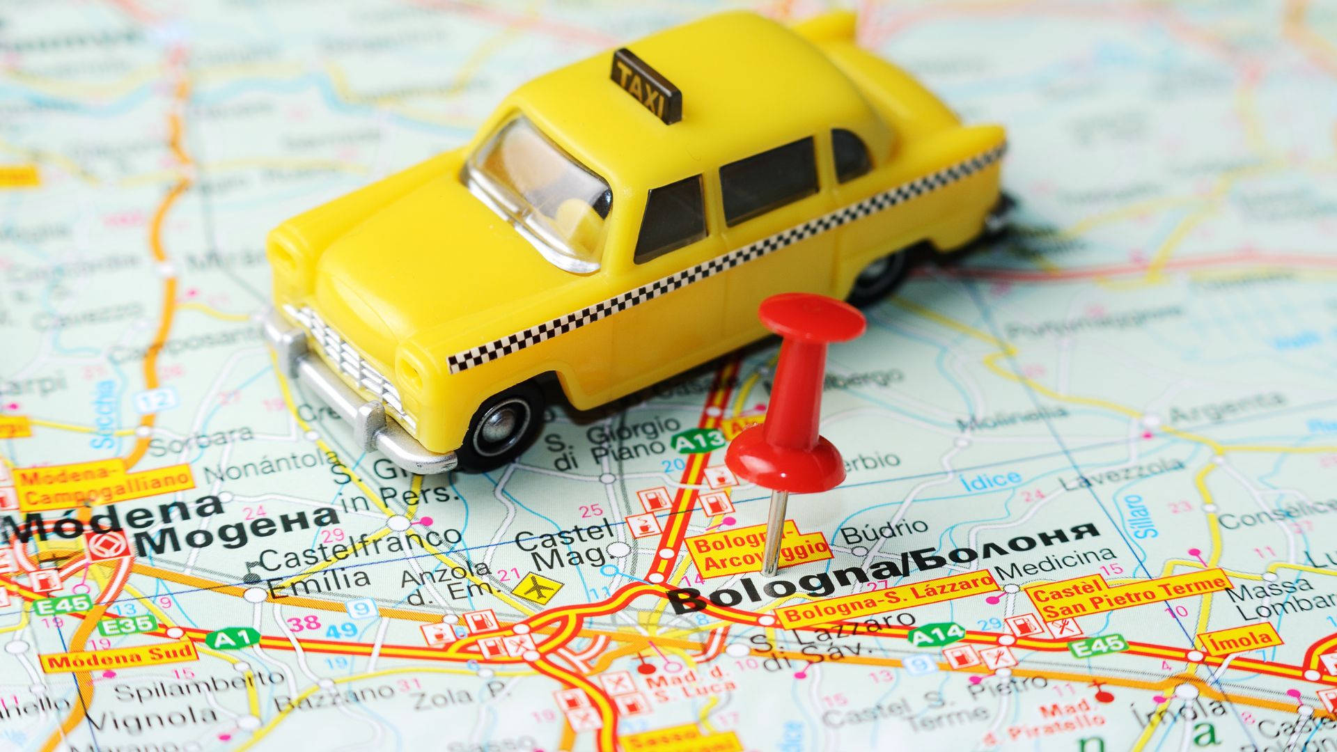 Toy Taxi On World Map Background