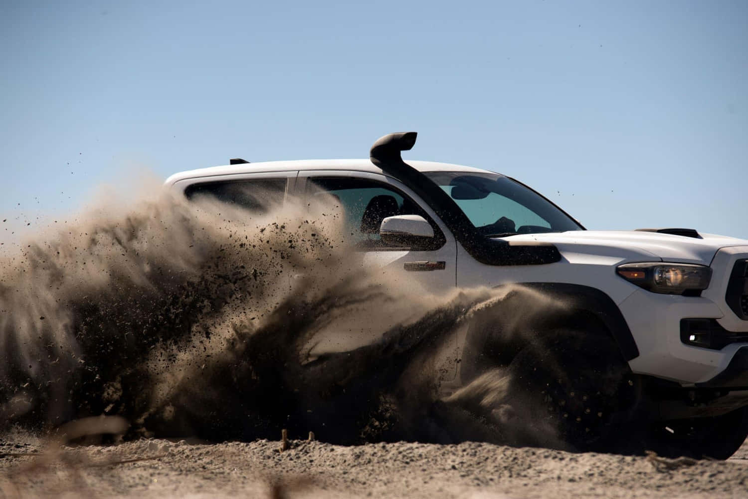 Toyota Trd Driving Through Dust