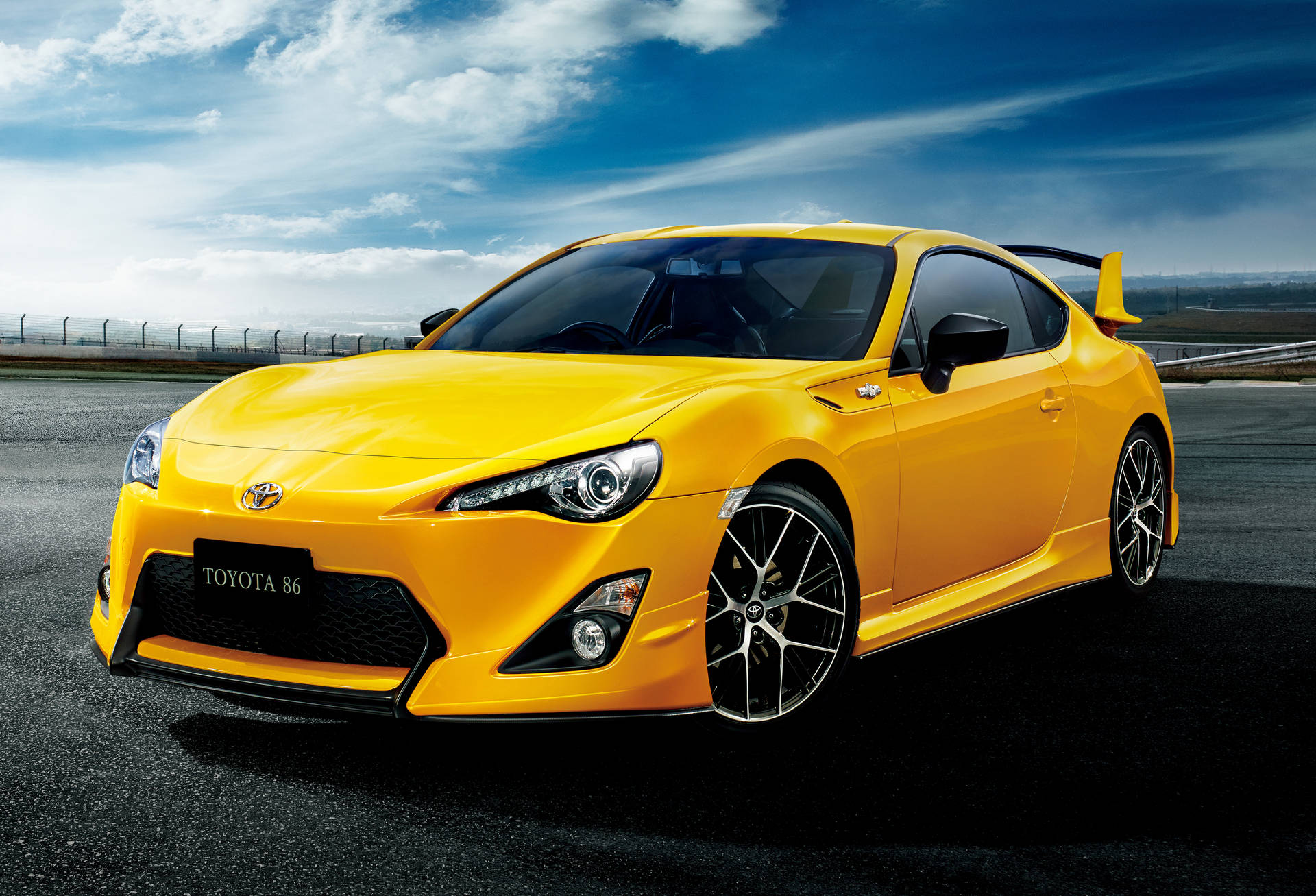 Toyota Yellow Sports Car Background