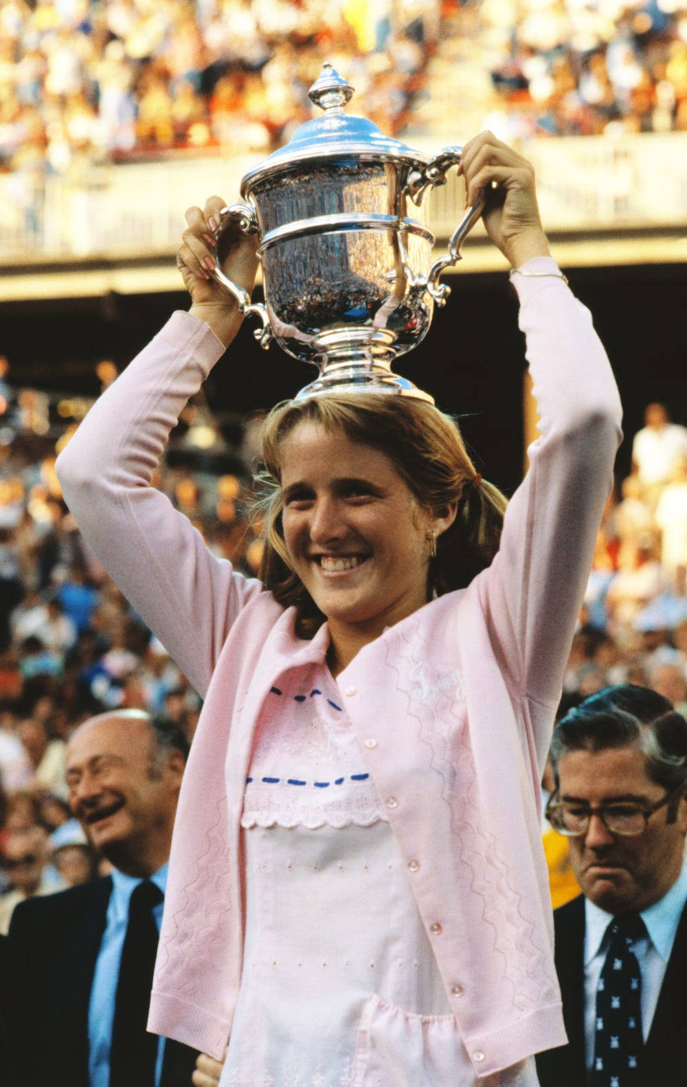 Tracy Austin Holding Trophy Background