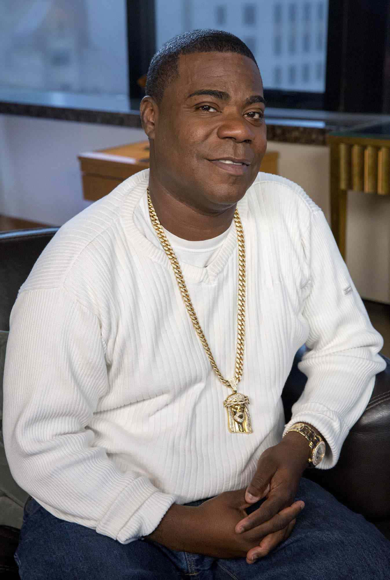 Tracy Morgan Smiling At An Event Background