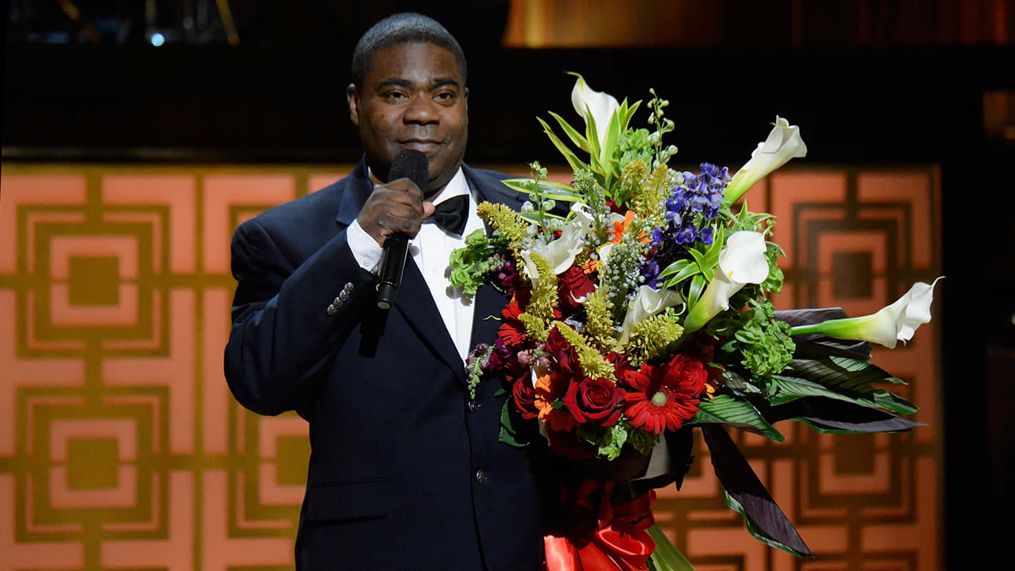 Tracy Morgan Smiling During An Event Background