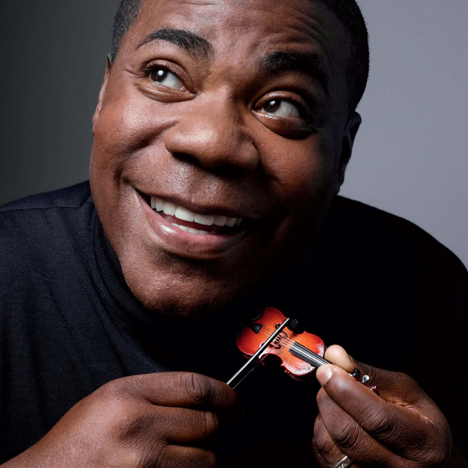 Tracy Morgan Striking A Pose During A Photoshoot Background