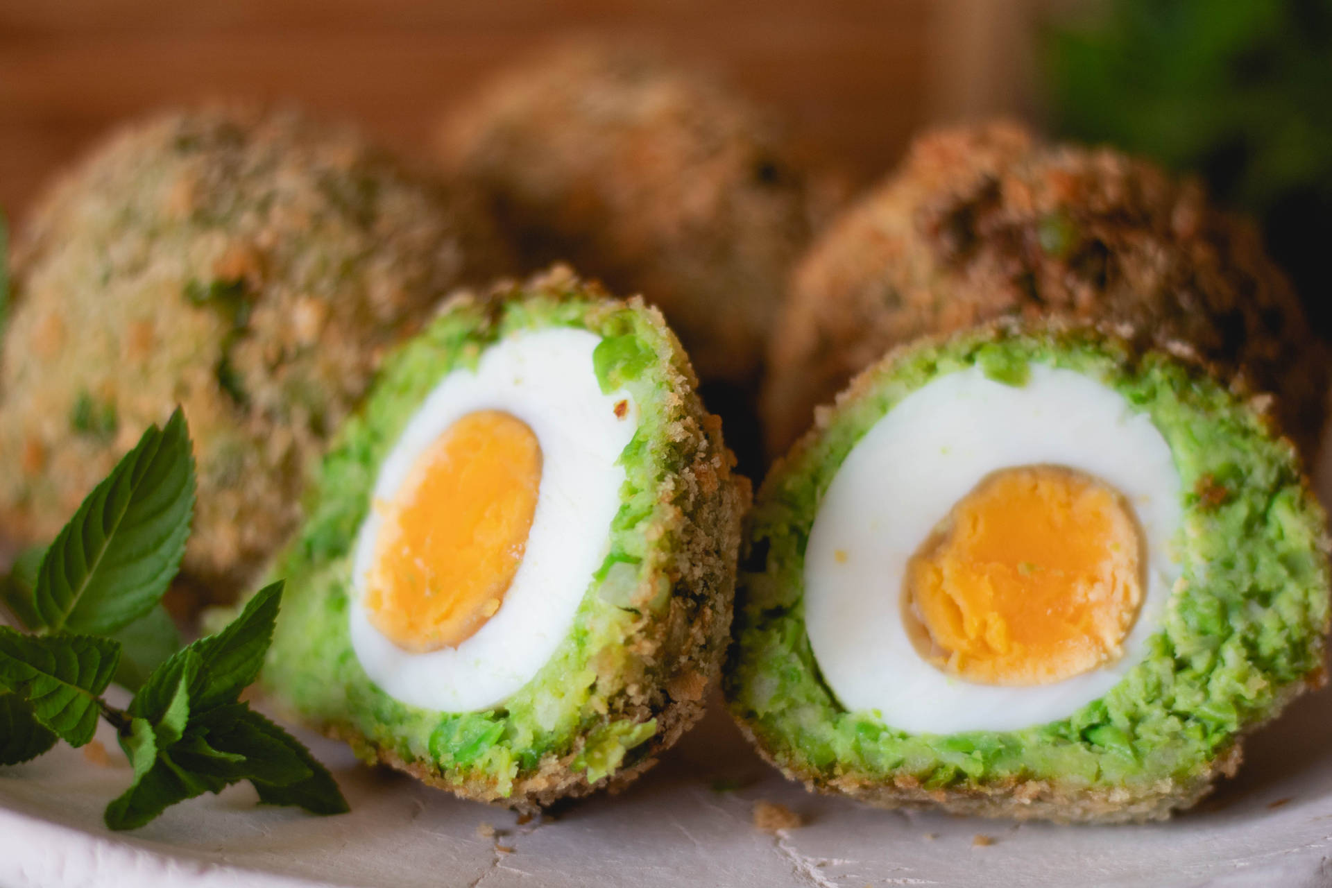 Traditional British Scotch Eggs Dish With Avocado Background