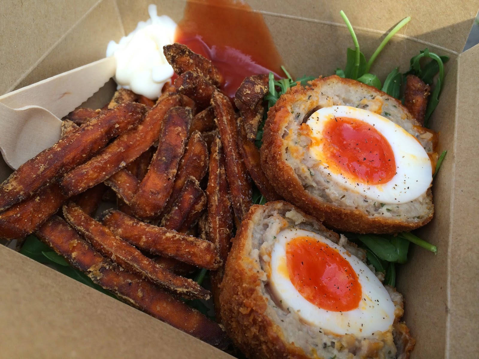 Traditional British Scotch Eggs Dish With Fried Potatoes Background