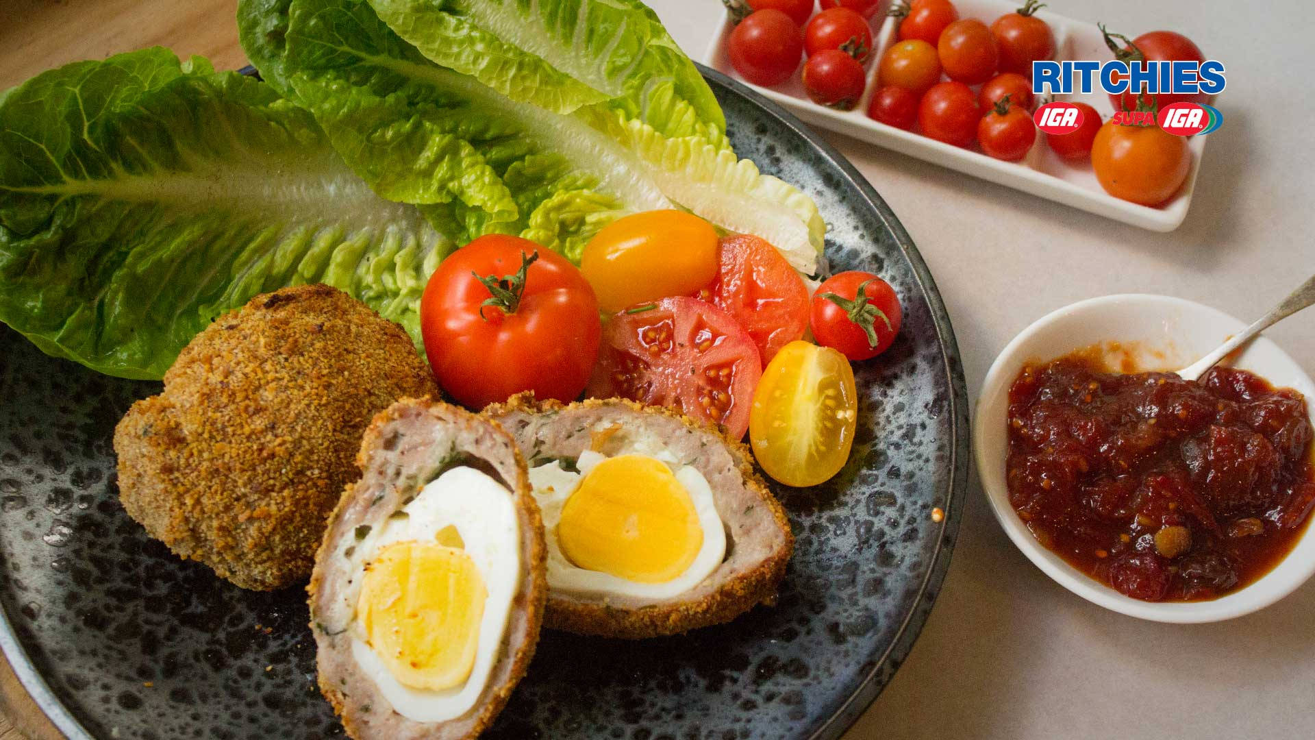 Traditional British Scotch Eggs Dish With Tomato Relish Background