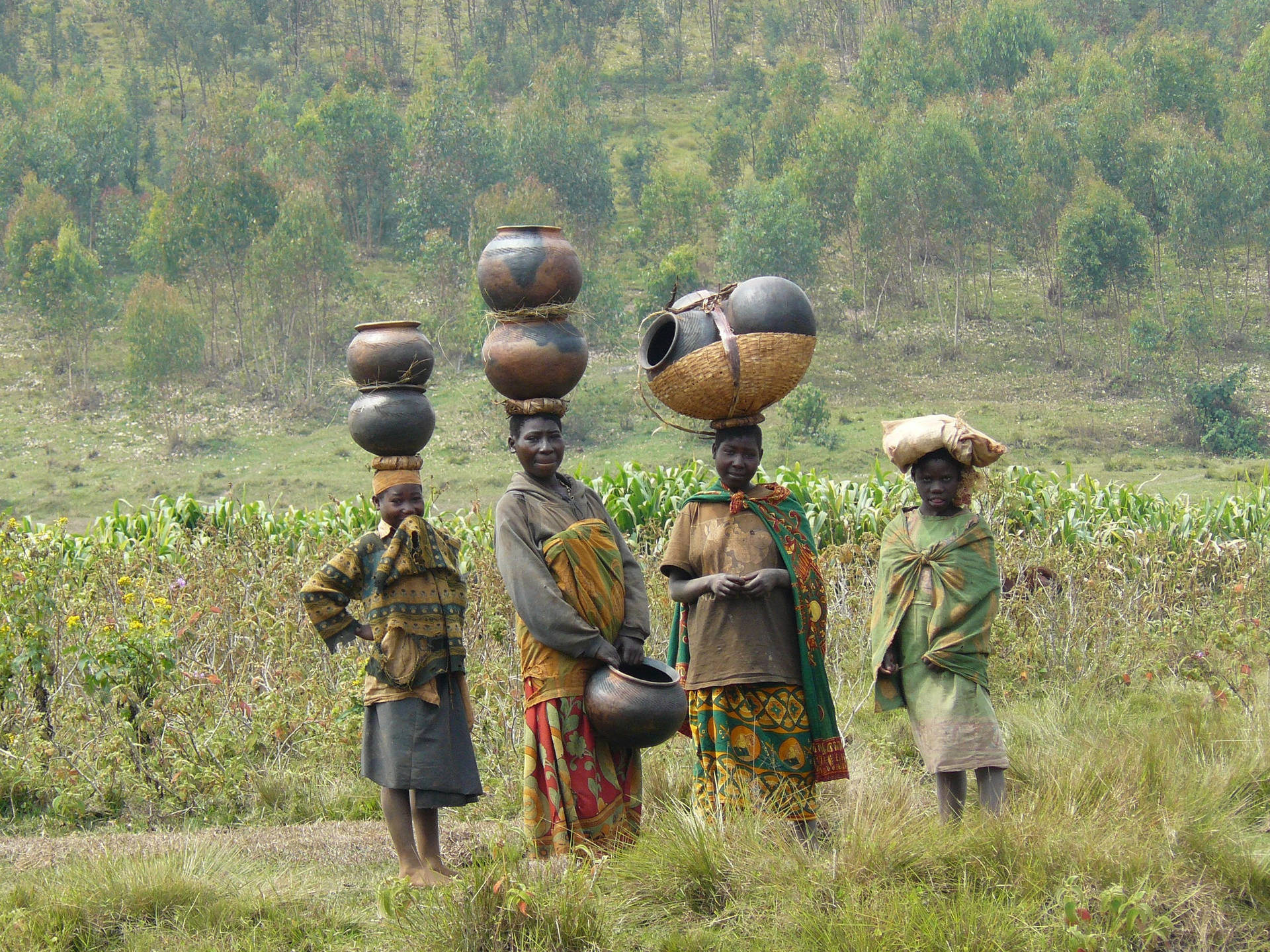 Traditional Burundi Women In Vibrant Attire Background