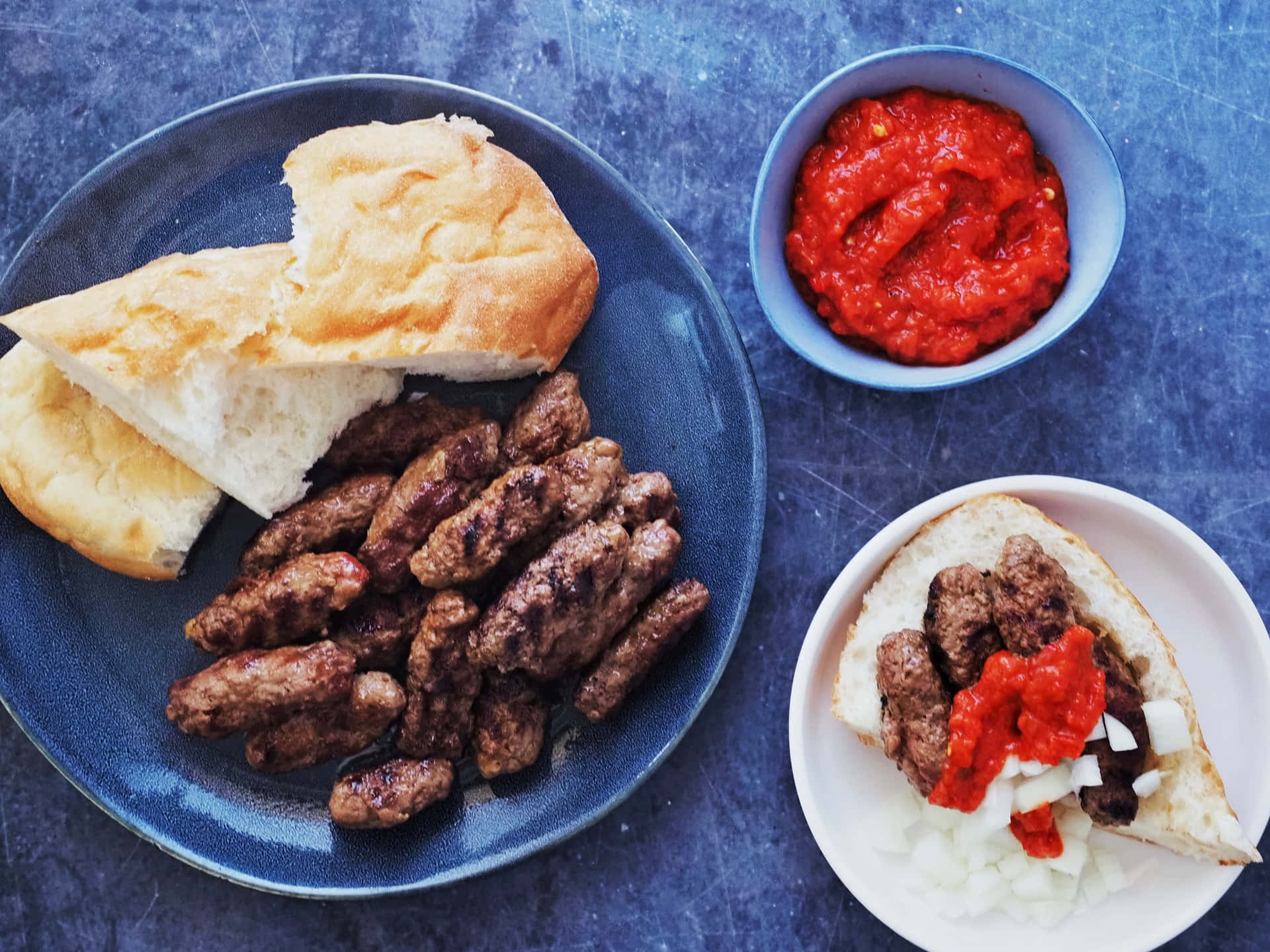 Traditional Cevapi Served With Warm Pita Bread Background