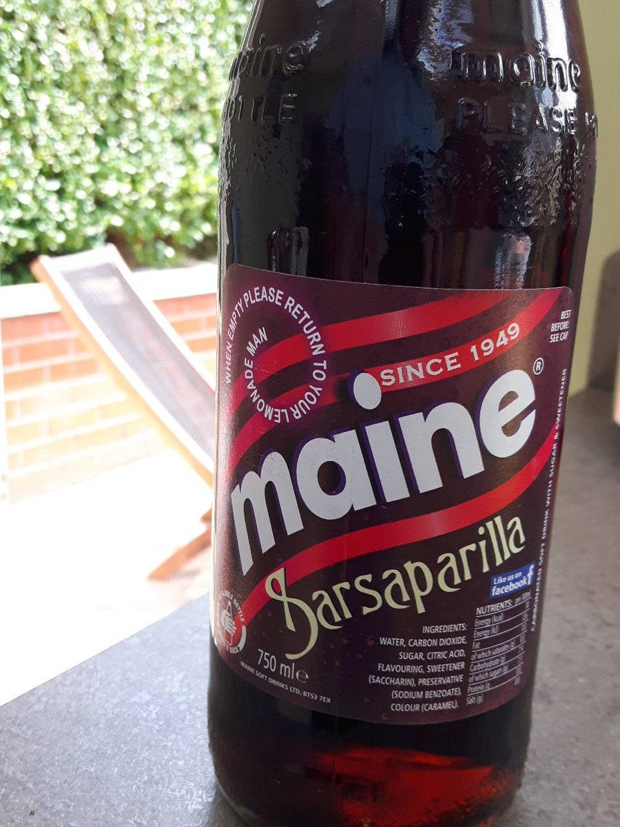 Traditional Maine Sarsaparilla Soft Drink In A Glass Bottle Background