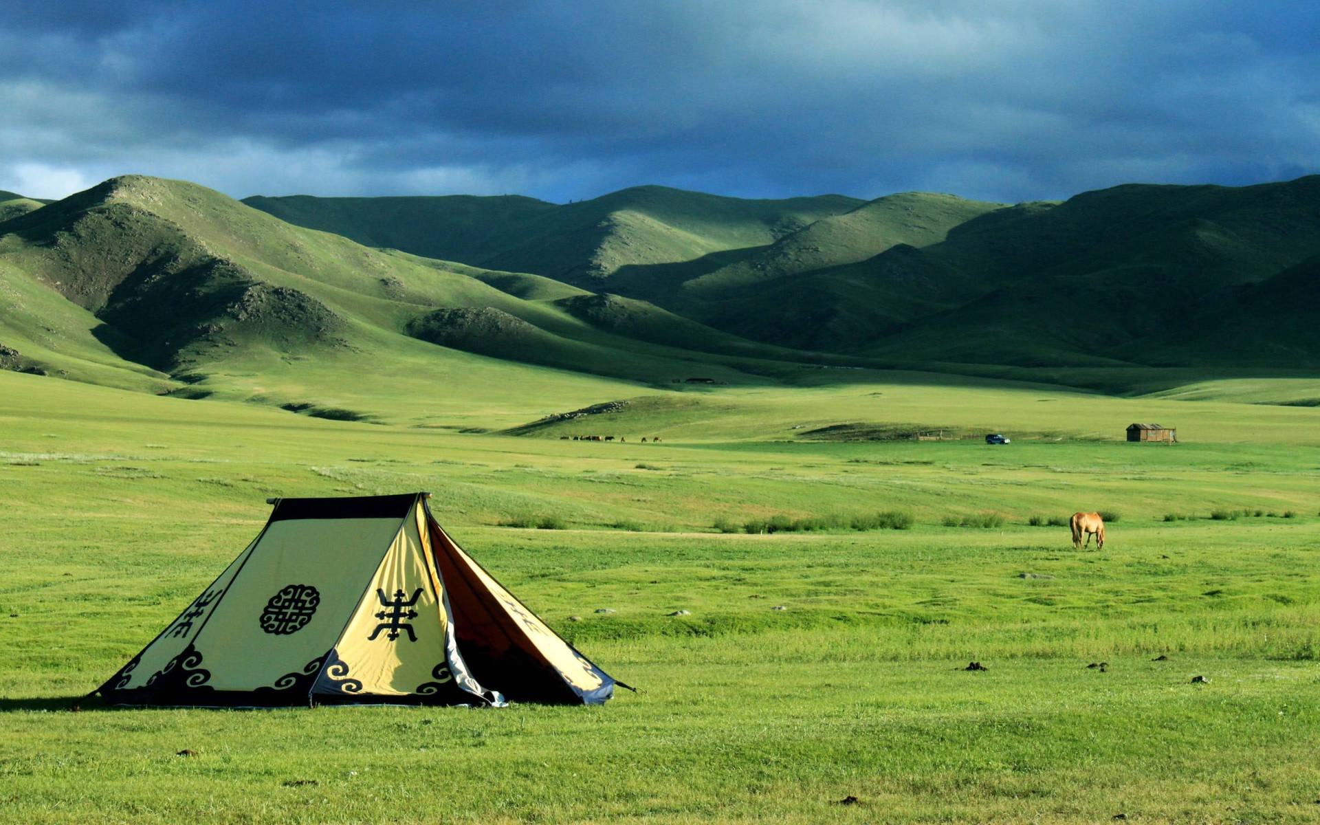 Traditional Mongolian Ger In A Picturesque Landscape Background