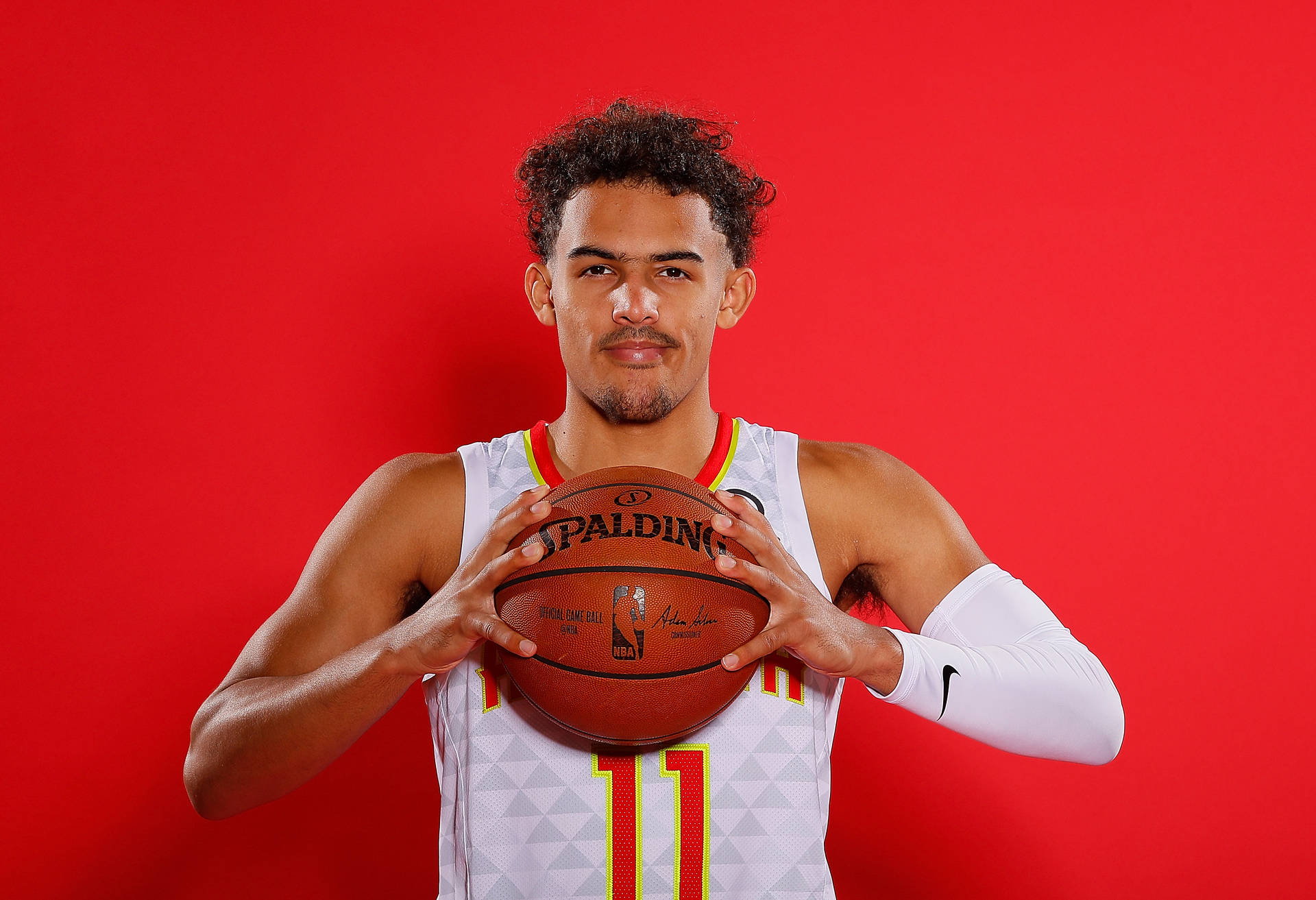 Trae Young In Red Background