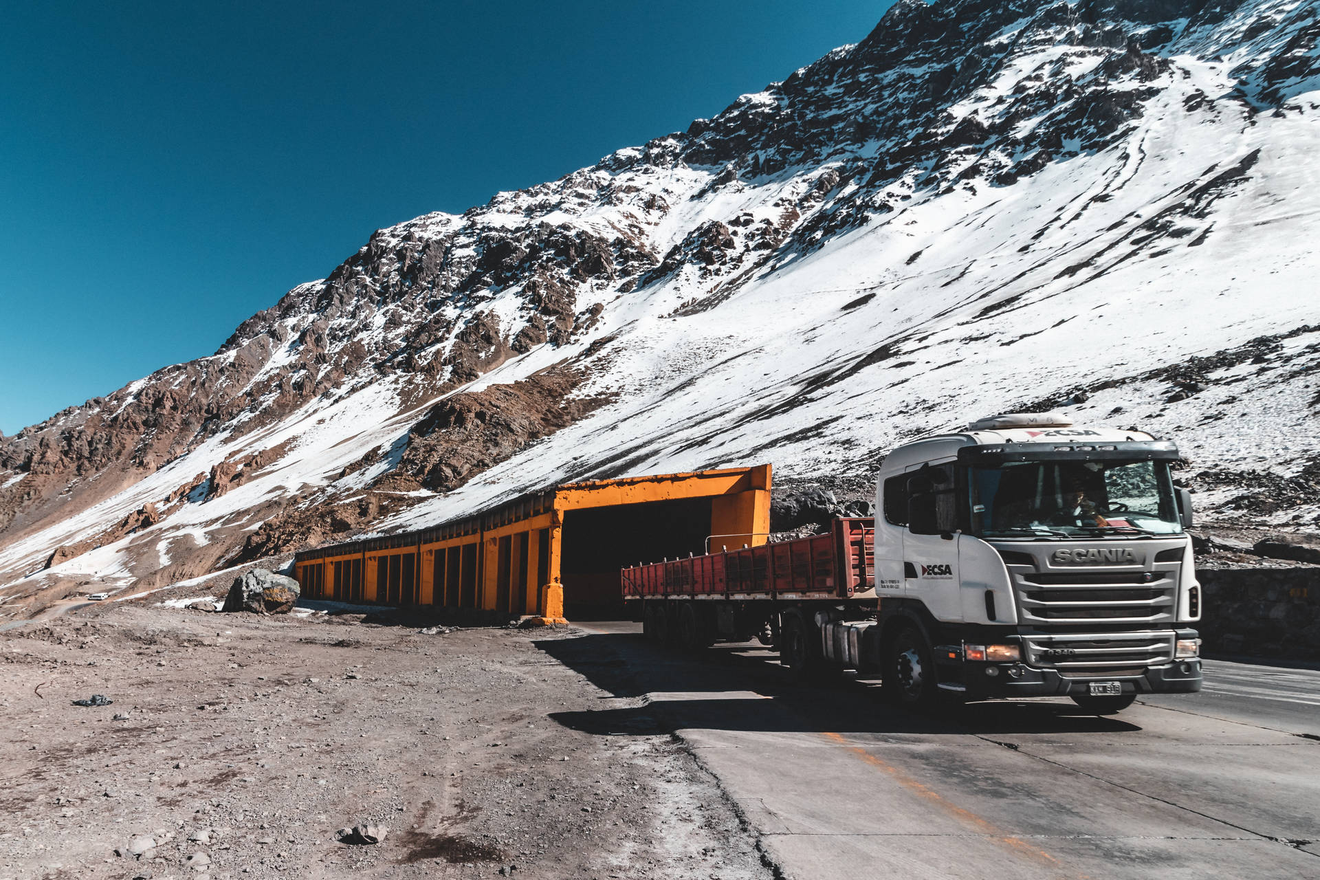 Trailer Truck At Andes Mountain Background