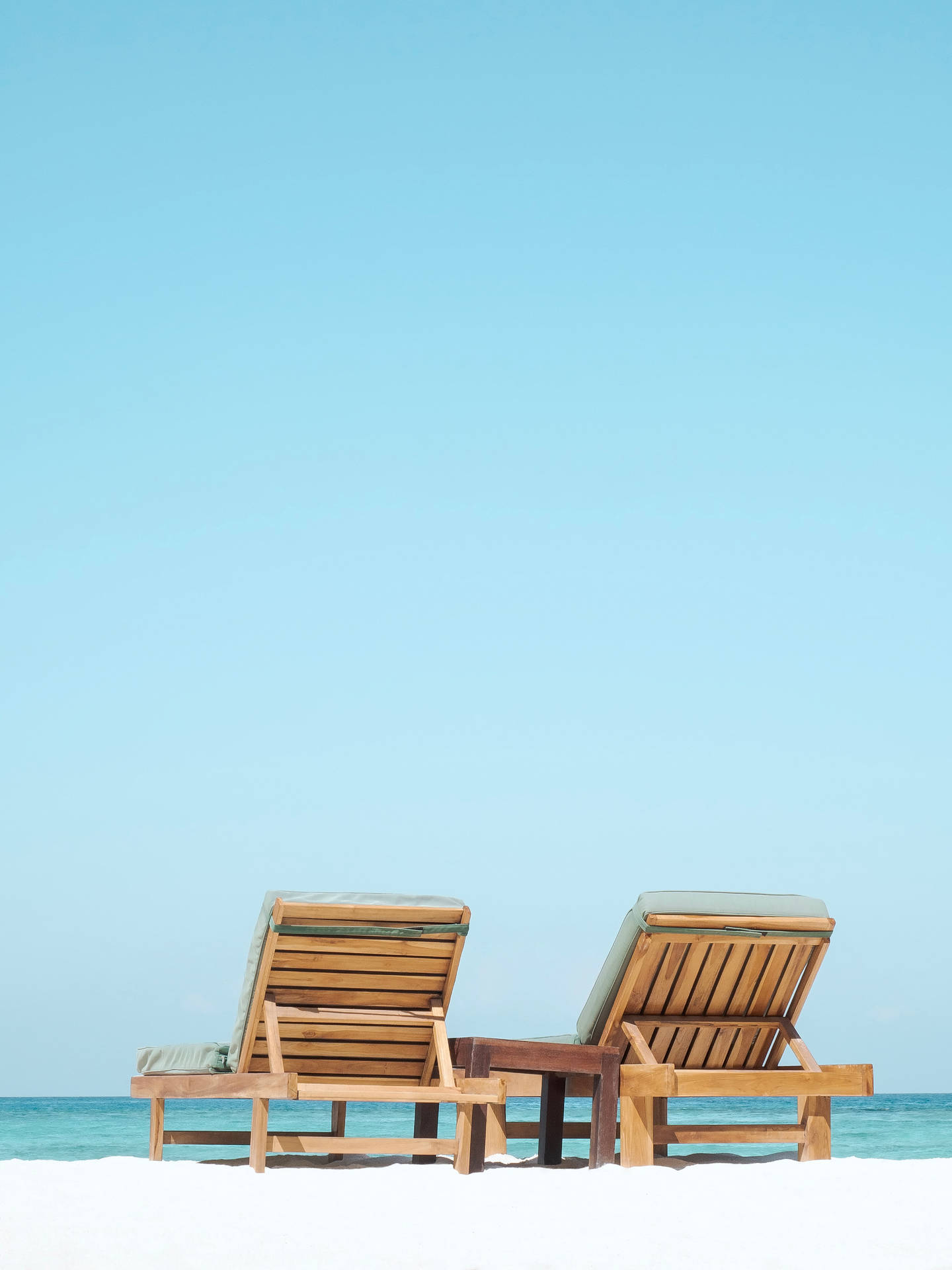 Tranquil Beach Loungers Awaiting Visitors
