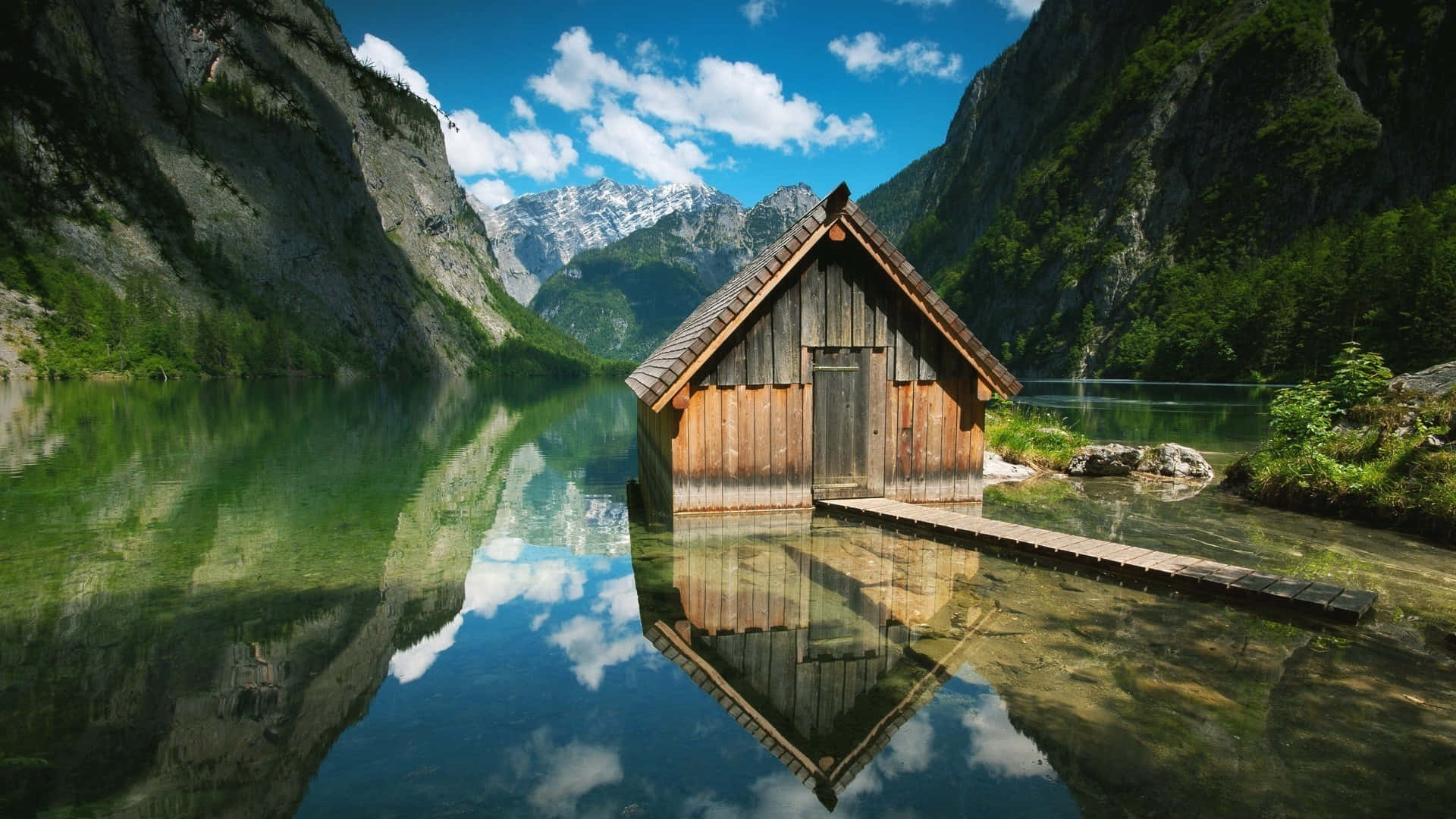 Tranquil Cabin By A River Background