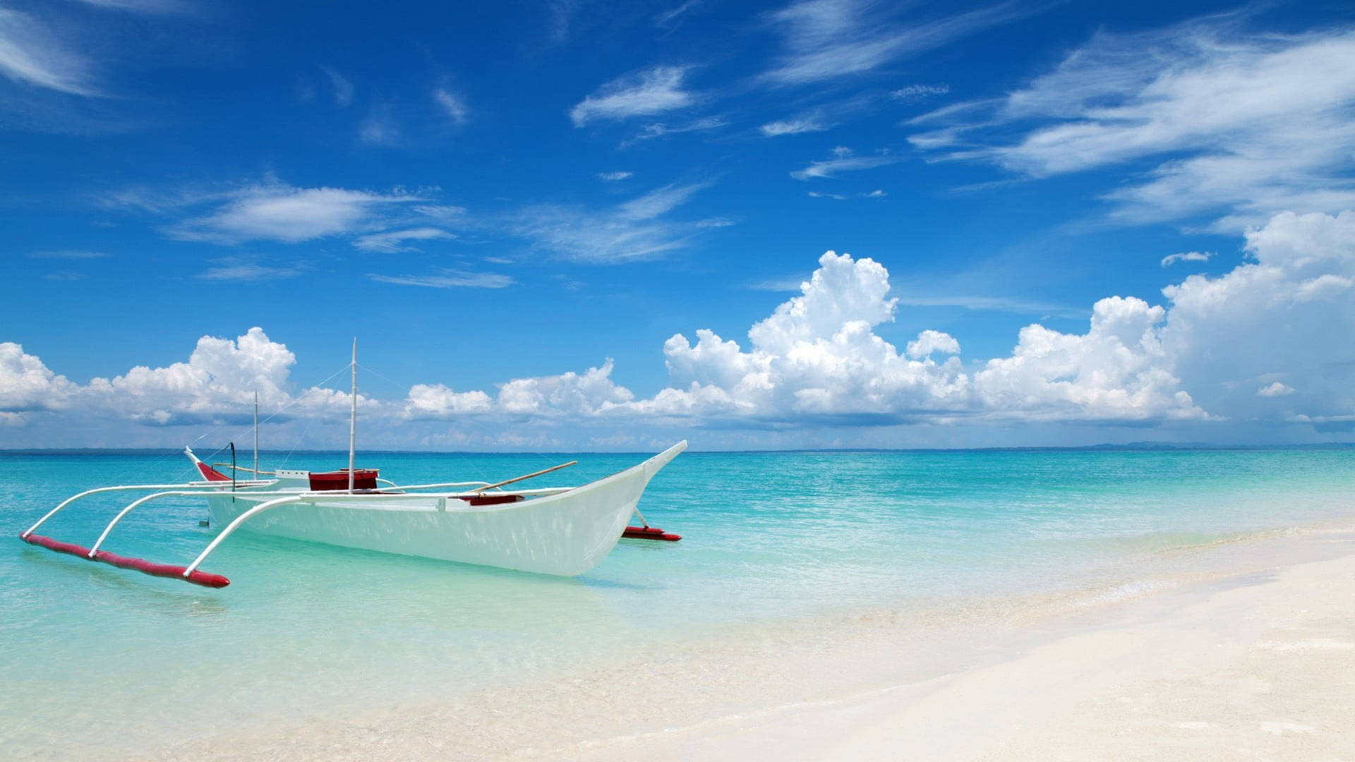 Tranquil Getaway - Boat Resting On A Pristine White Beach