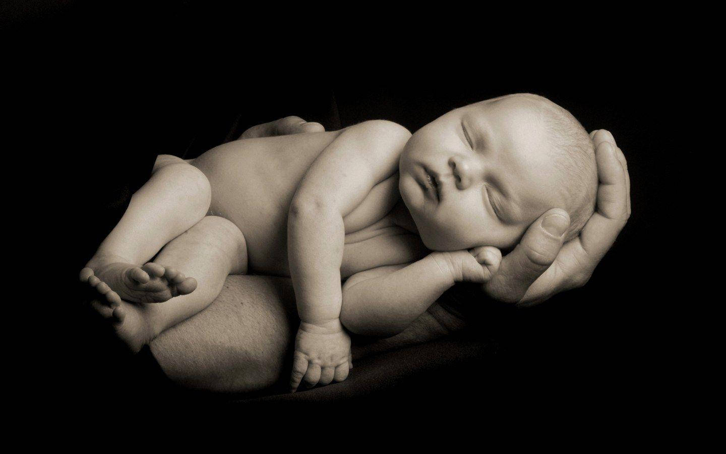 Tranquil Newborn In Calm Sleep Background