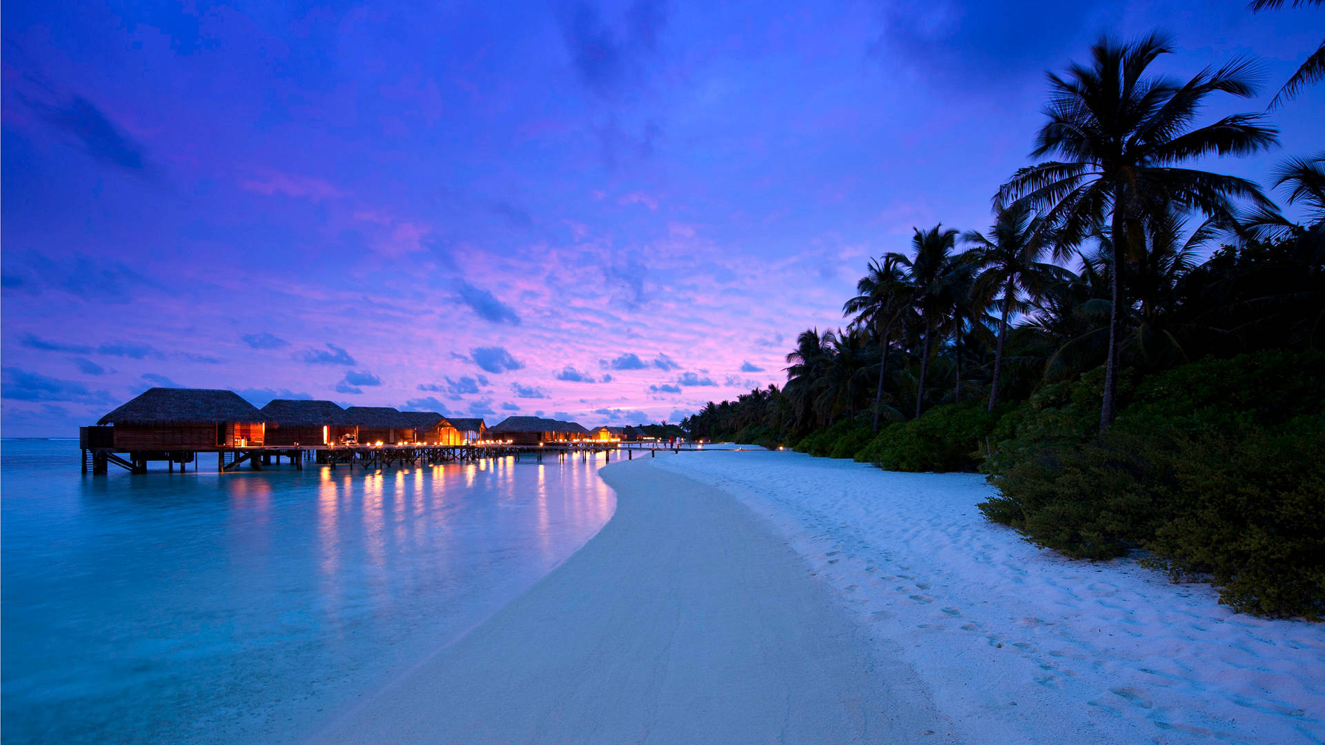 Tranquil Night At Conrad Maldives Rangali Island Beach Background