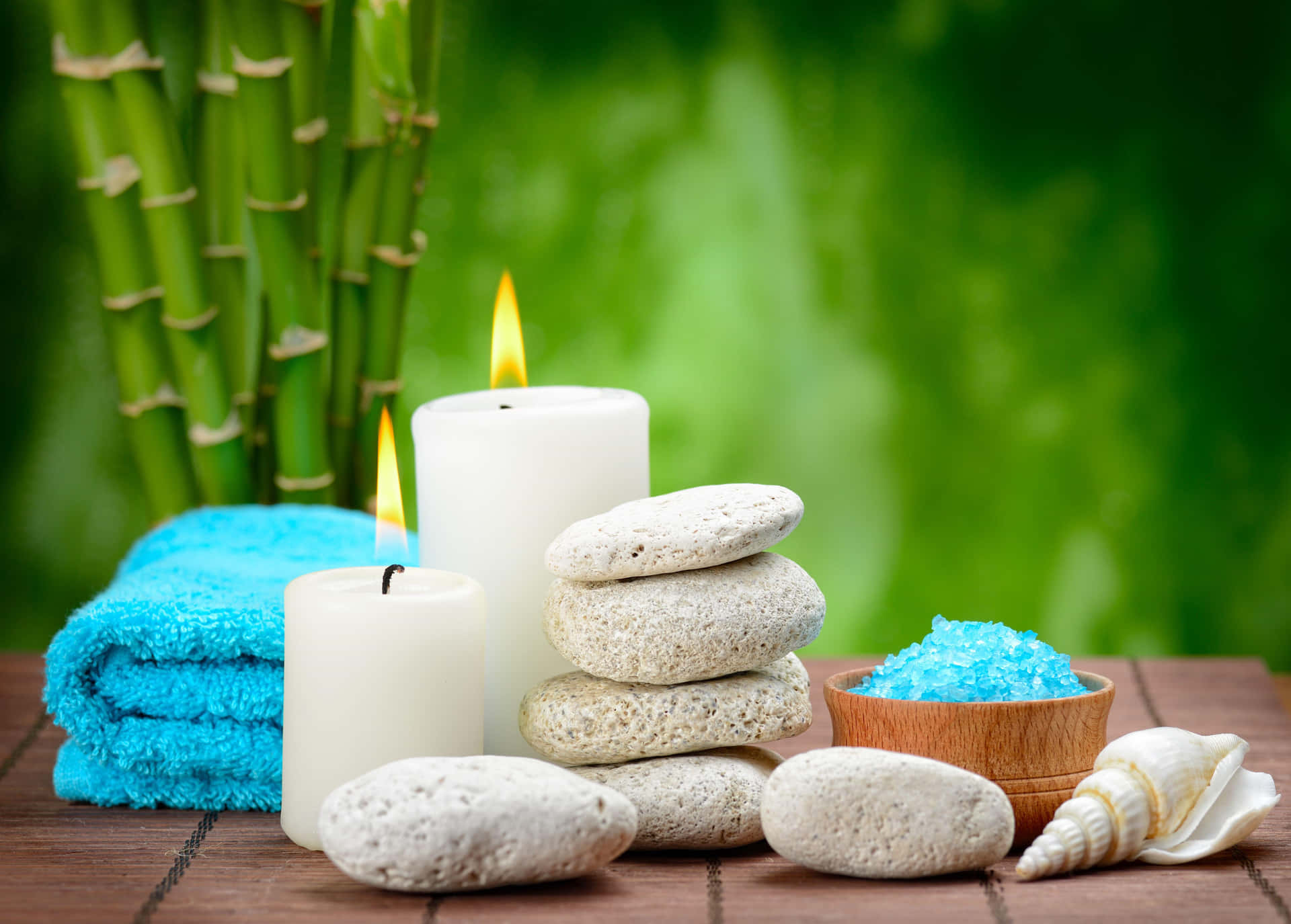 Tranquil Spa Settingwith Candlesand Bamboo Background
